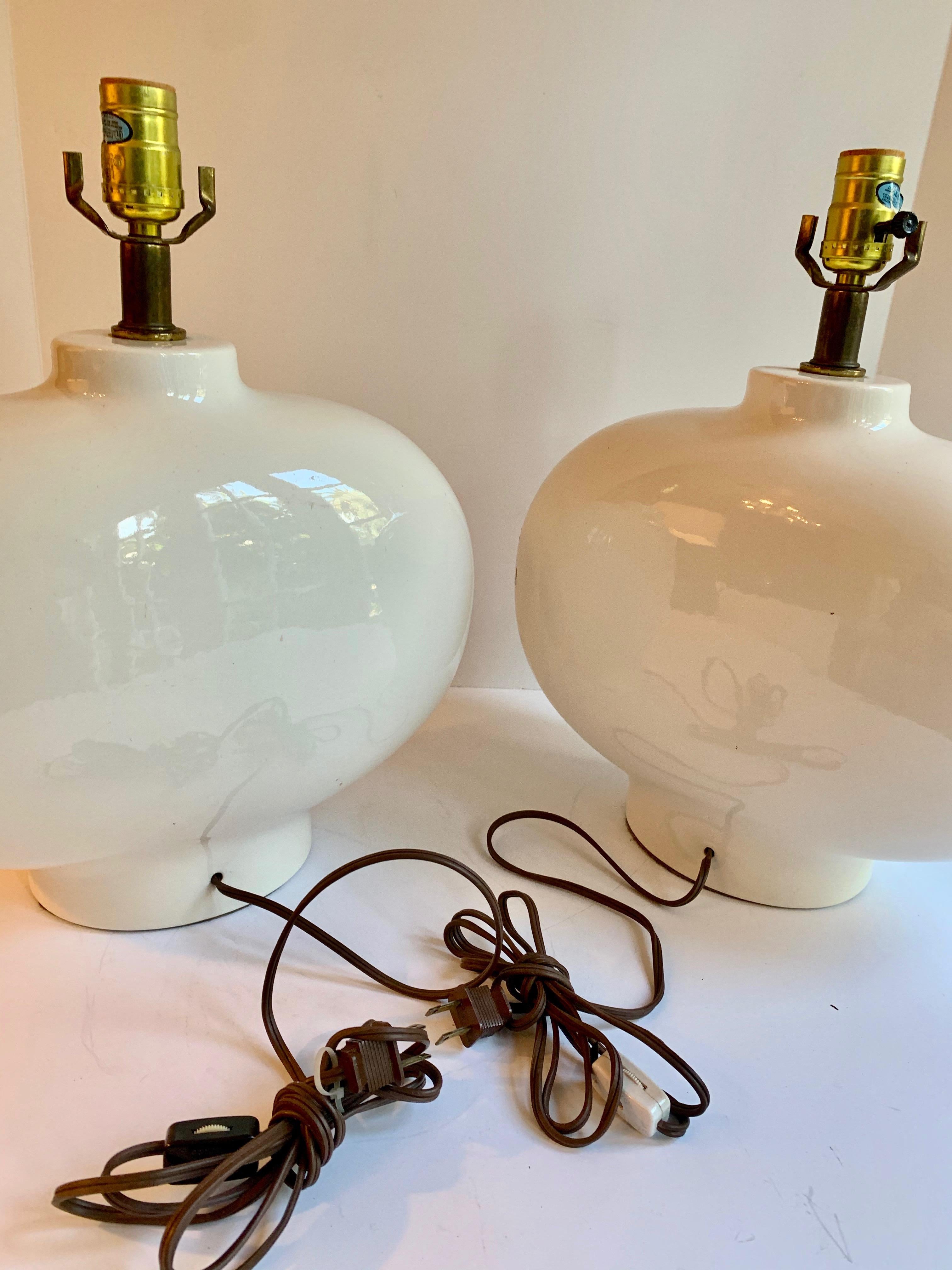 Simple, yet wonderful pair of oval ceramic table lamps - original wiring with a switch on the cord or at the socket. Shades not included.