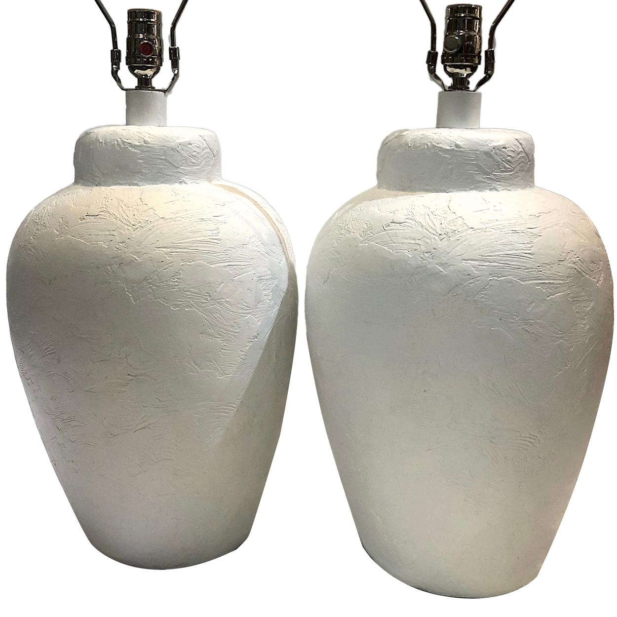 A pair of circa 1960s Italian large textured white ceramic table lamps.

Measurements:
Height of body 21