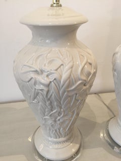 Pair of White Ceramic Table Lamps with Raised Floral Pattern on Lucite Bases