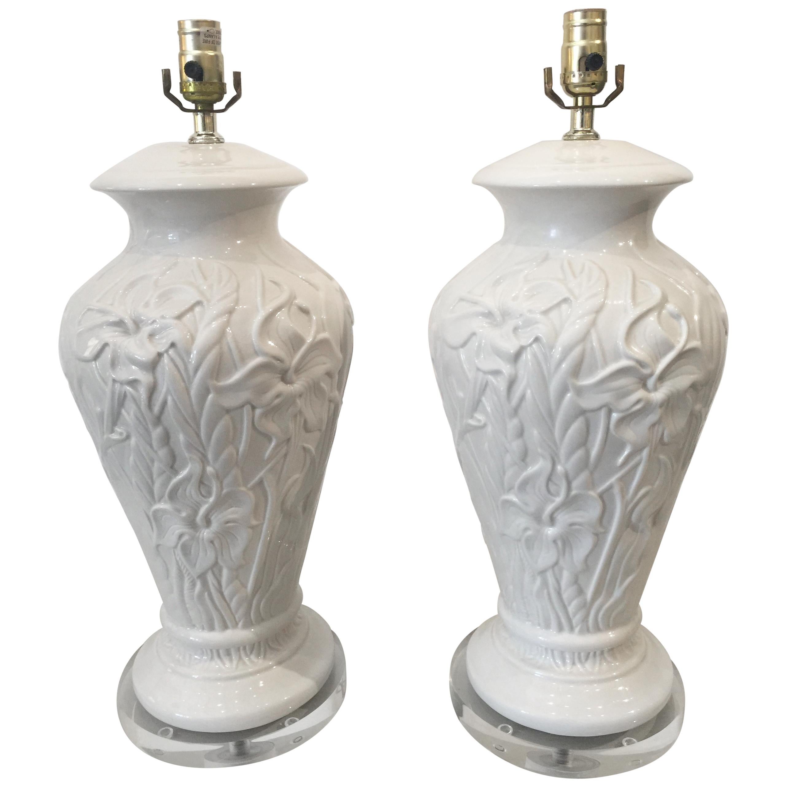 Pair of White Ceramic Table Lamps with Raised Floral Pattern on Lucite Bases For Sale