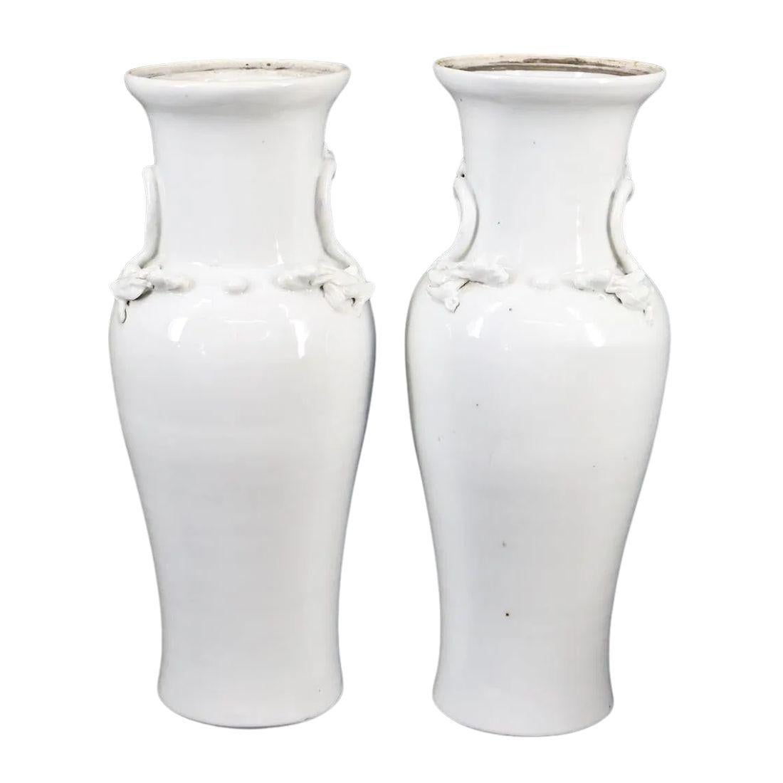 XX secolo Pair of White Chinoiserie Vases With Dragon Motif in vendita