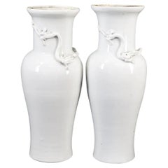 Pair of White Chinoiserie Vases With Dragon Motif