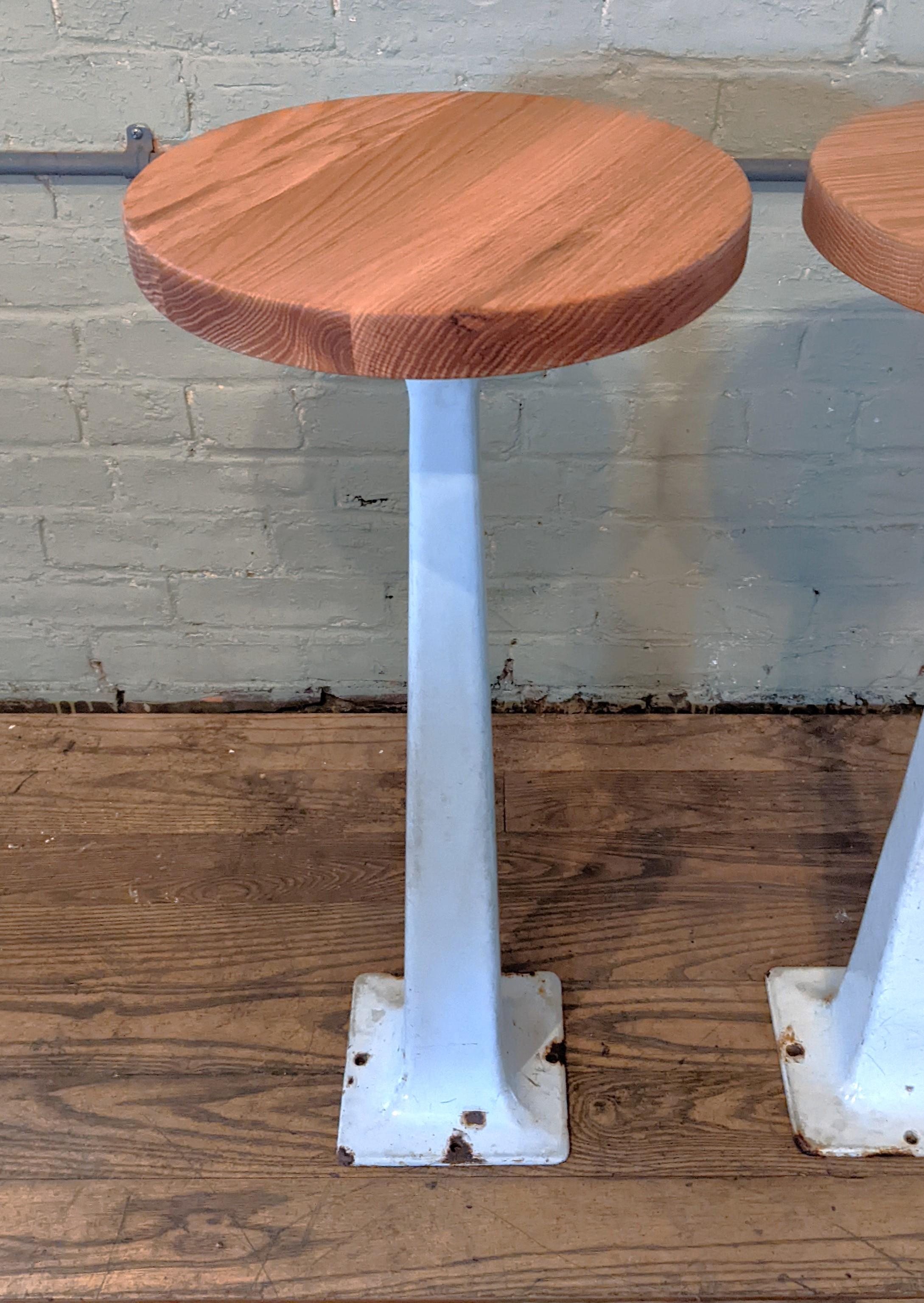 Cast Pair of White Diner Counter Stools For Sale