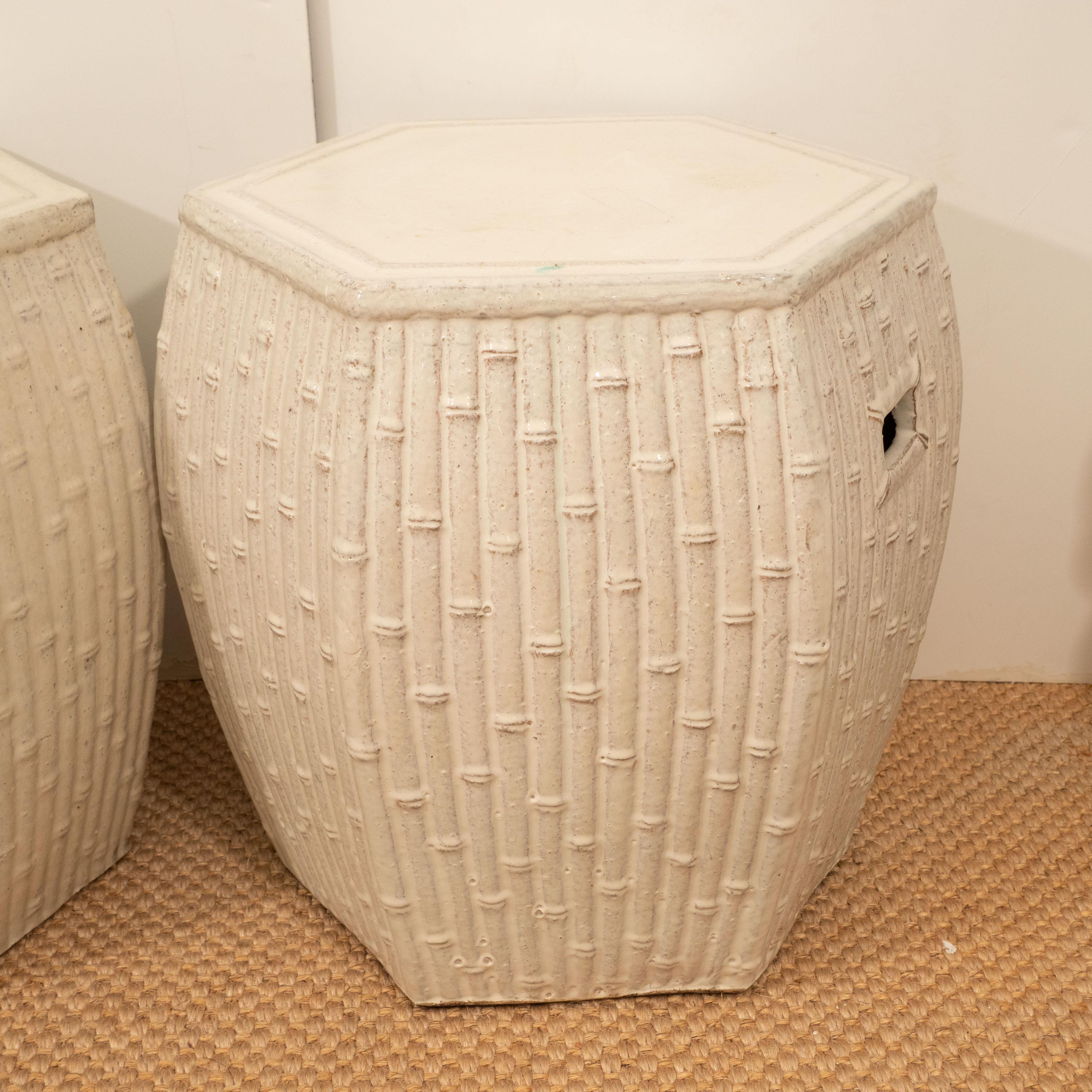 These ceramic garden stools, with their creamy white color, can mix with any color scheme, indoor or outdoor. Their hexagonal shape and bamboo motif make them a unique choice for a side table or seat. Priced individually at $650 each.