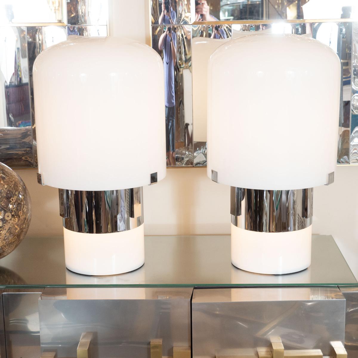 Pair of white glass and chrome cylindrical table lamps.