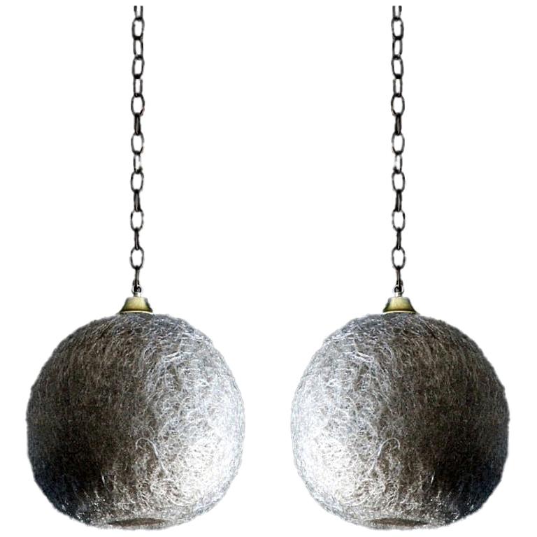Pair of white glass thread globe hanging lights For Sale