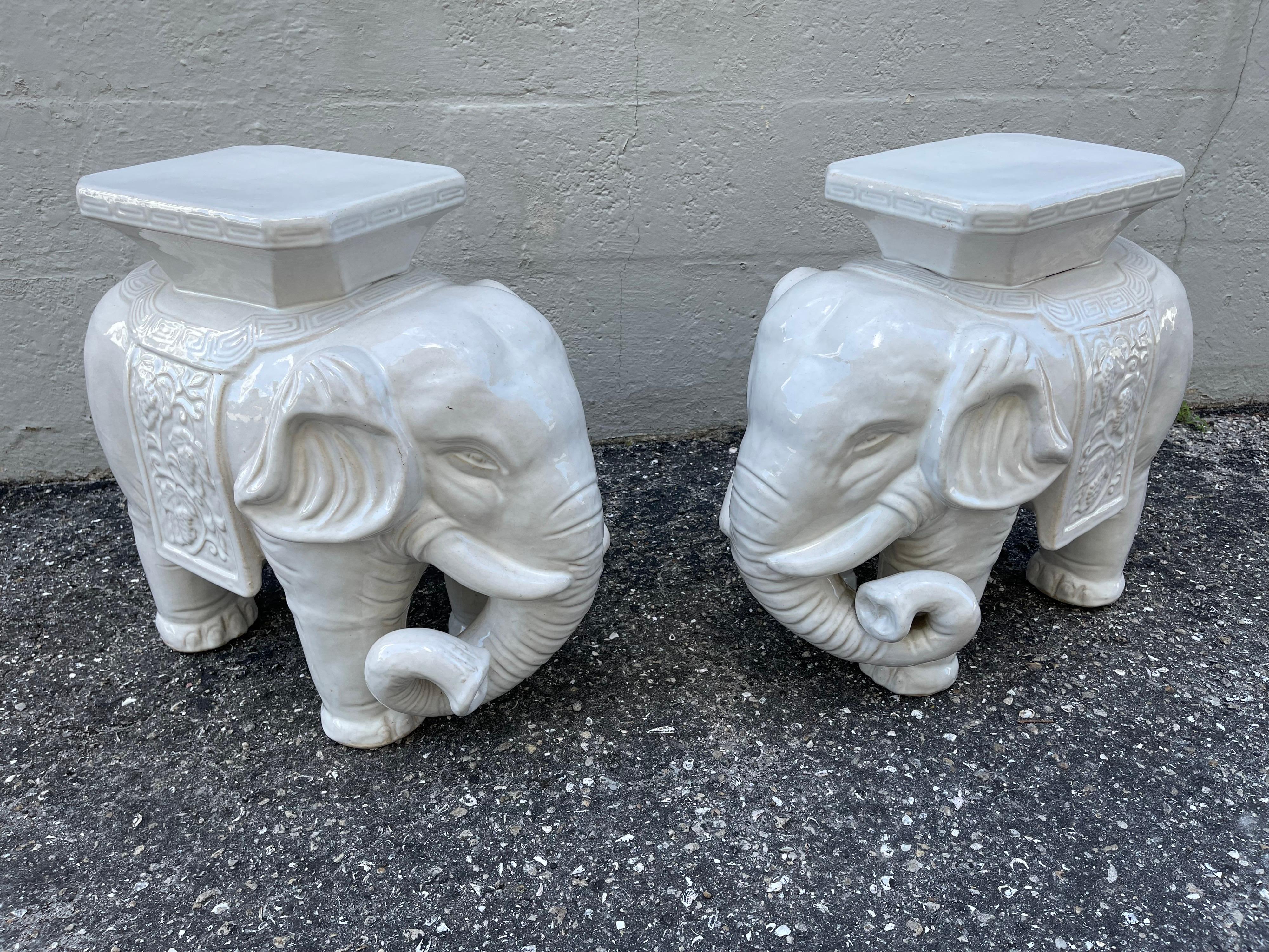 Beautiful pair of opposing glazed white terra cotta elephant garden tables / seats.