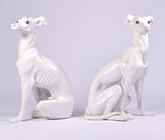 Pair of White Glazed Terracotta Greyhounds