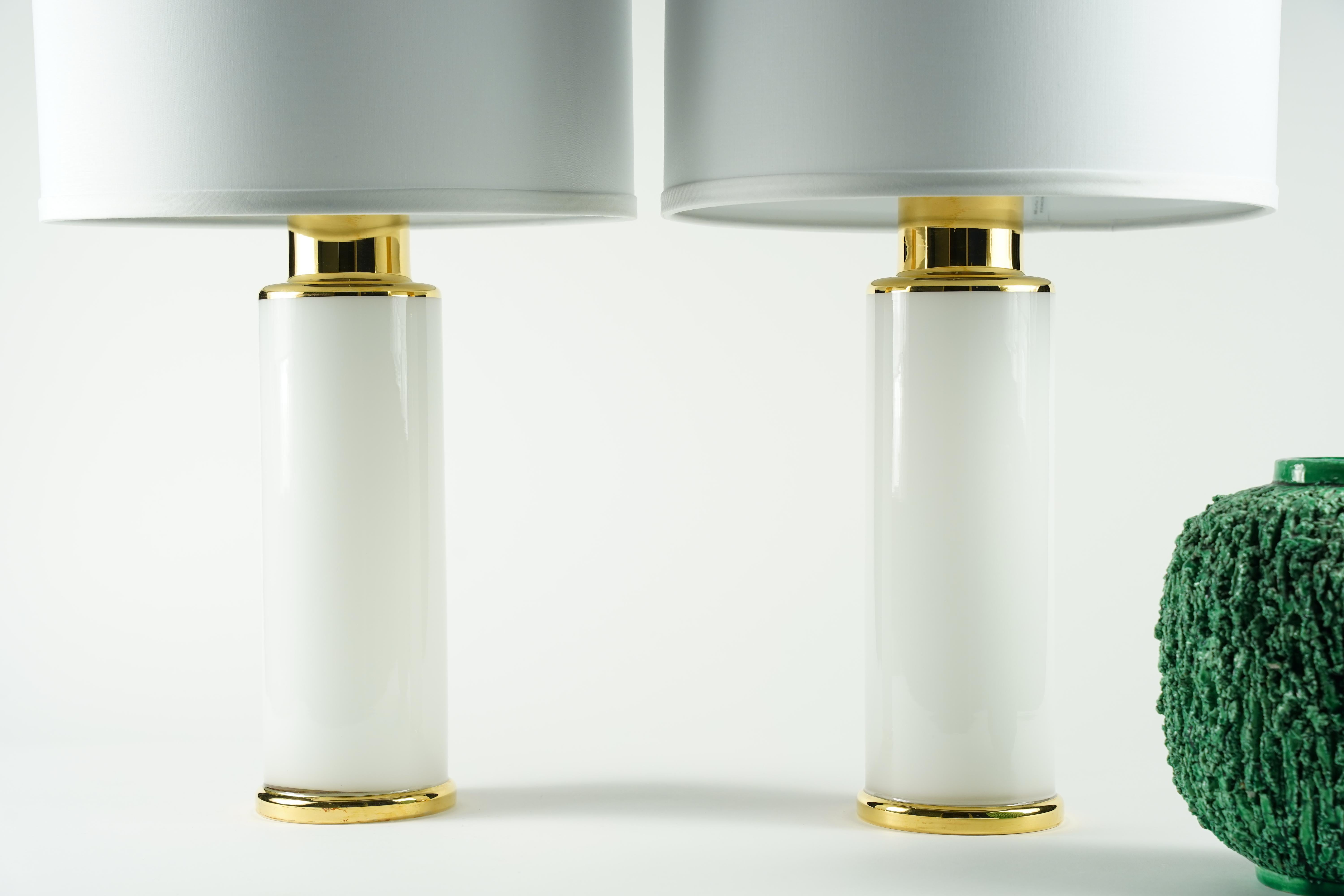 Pair of white/gold glass lamps by Luxus, Sweden, 1980,  Classy table lamps by Luxus, Sweden.

Rewired for the US.
Shades not included.