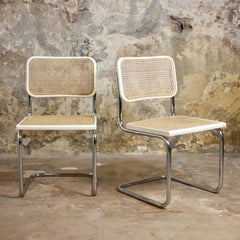 Pair of white Italian Cesca chairs, designed by Marcel Breuer, 1970s
