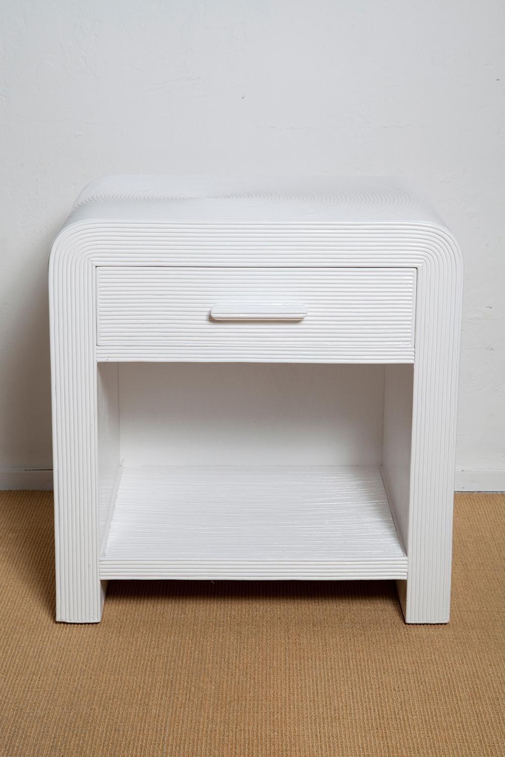 Our vintage pair of 1970s white lacquered split bamboo night stands feature a graphically interesting concentric ring pattern which makes them equal parts modern and charming!