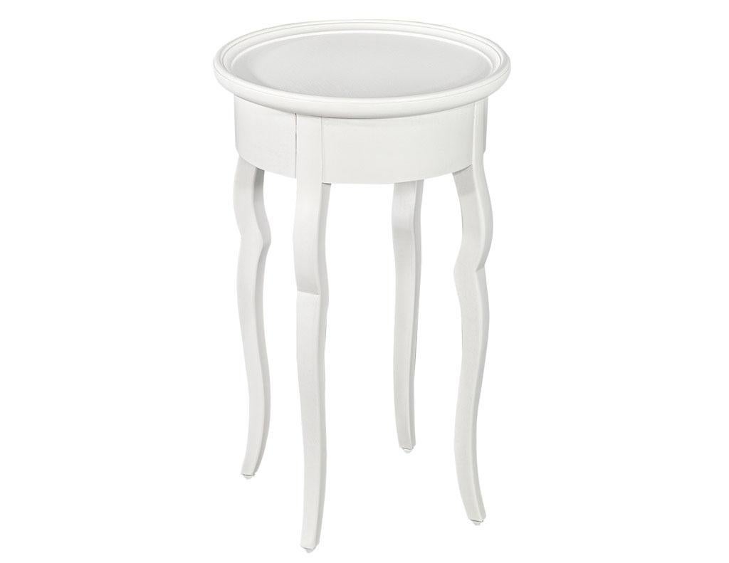 Pair of White Lacquered mahogany drink tables by Baker Furniture. Featuring curved jellyfish design with satin white lacquered finish. Brand new, American, by iconic American manufacturer Baker Furniture. Price includes complimentary curb side