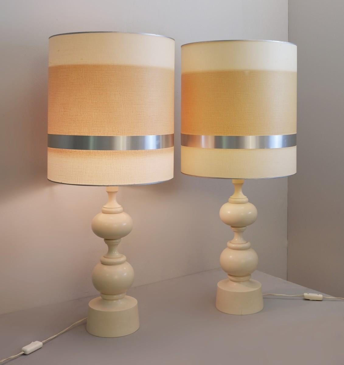 Pair of white lacquered turned wood lamps.