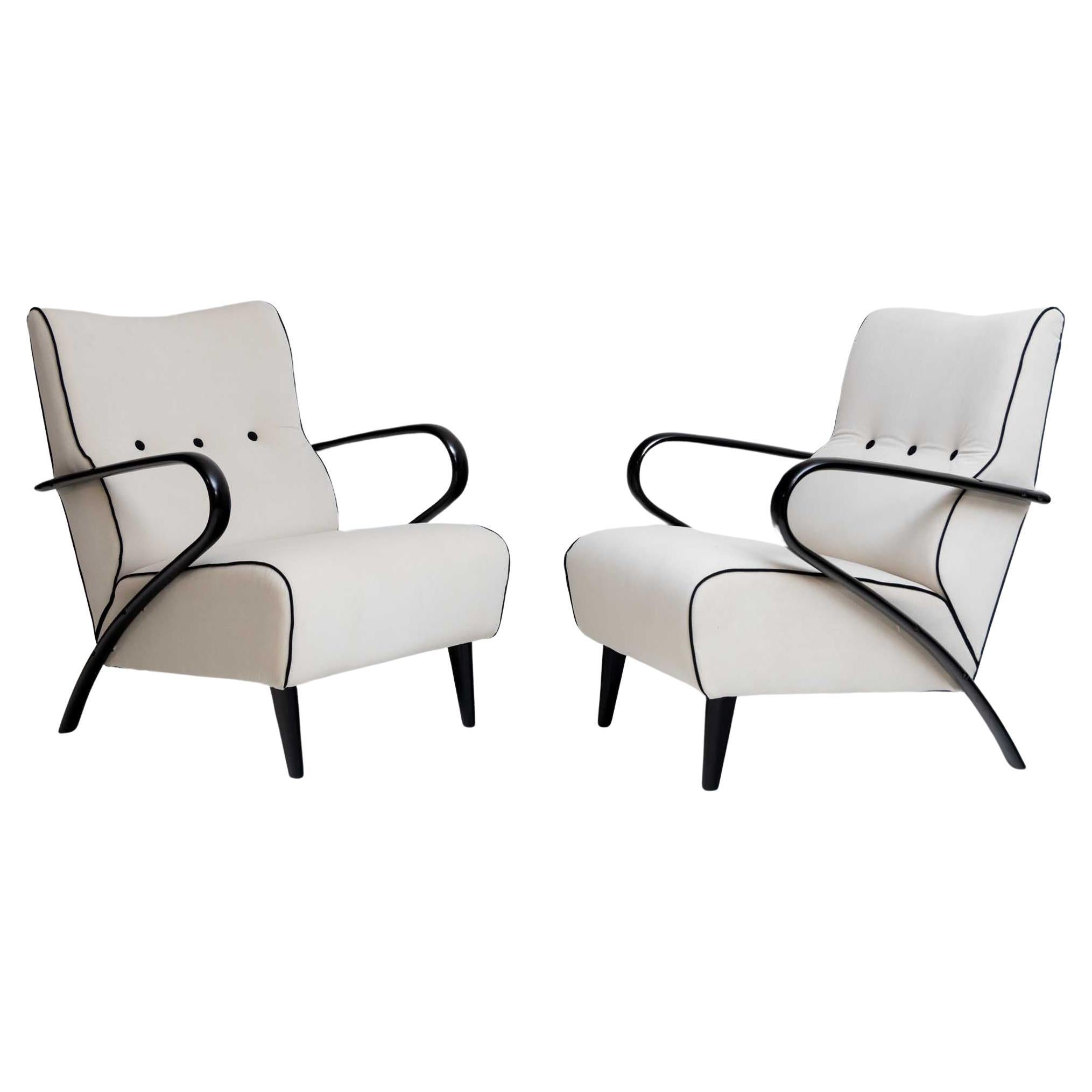 Pair of white Lounge Chairs with black Armrests, Italy 1950s