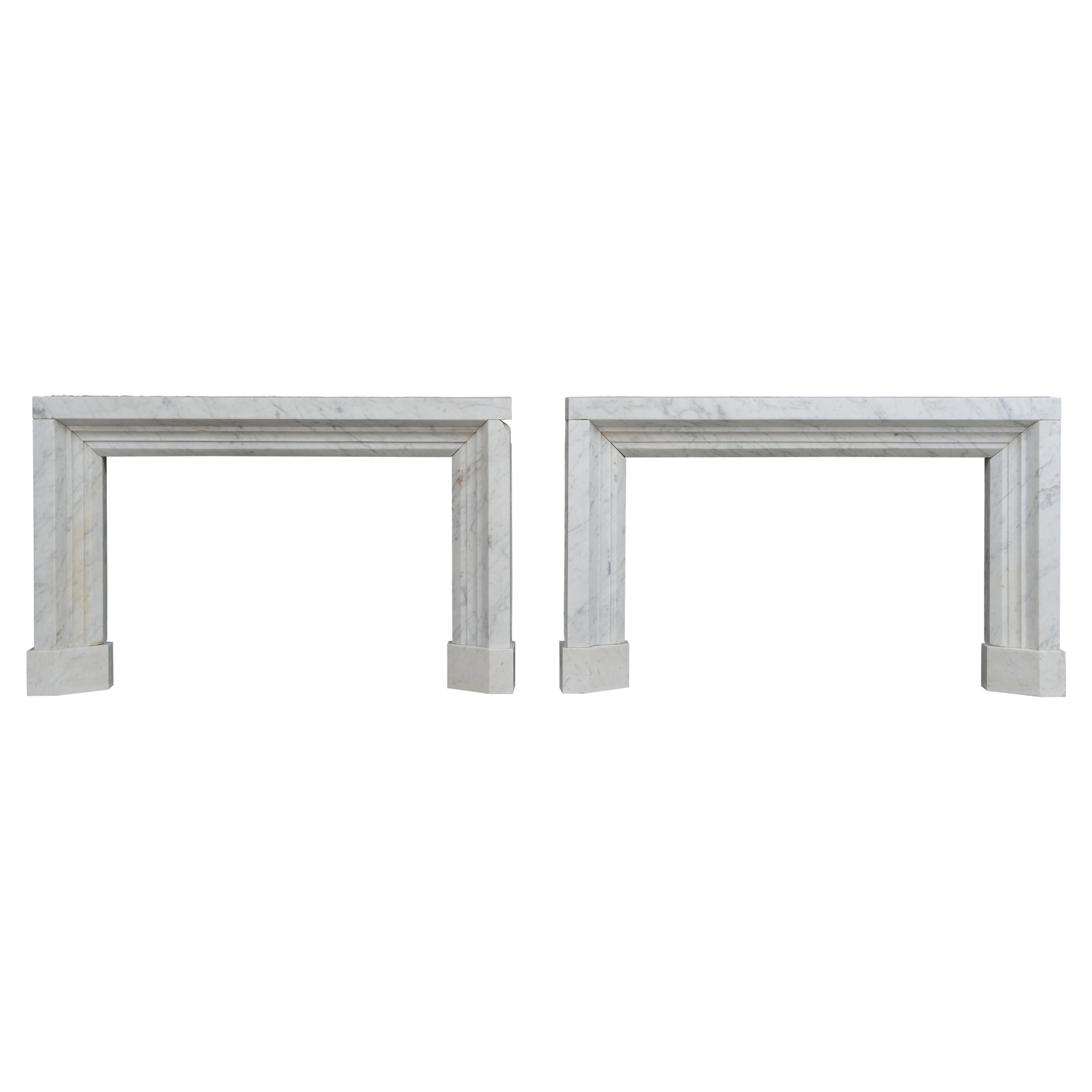 Pair of White Marble Bolections / Profiled Fireplace Mantels