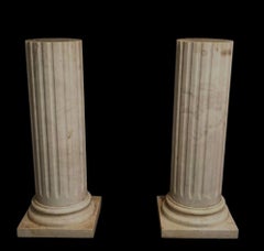 Pair of white marble columns, 102 cm high