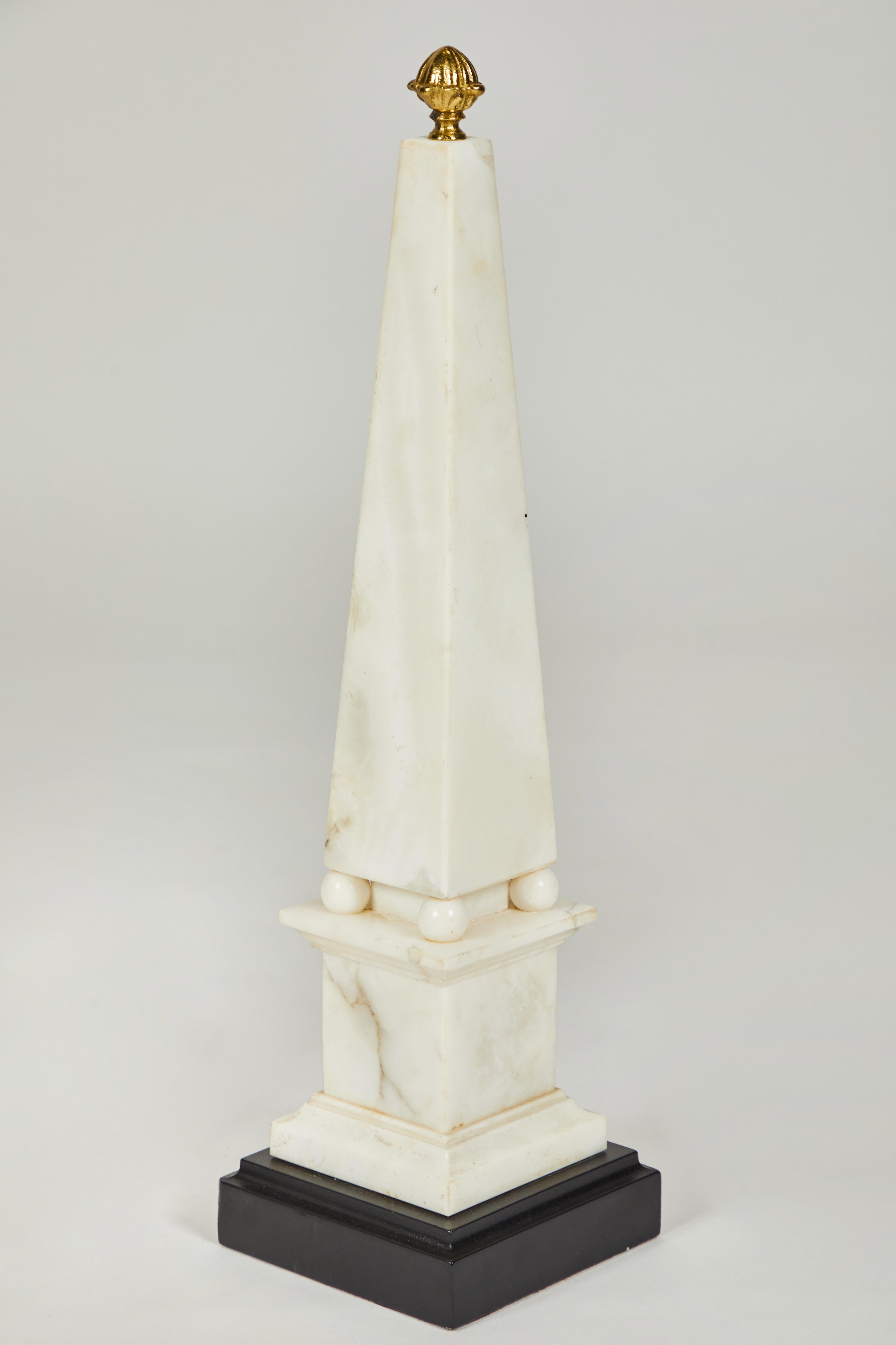 Pair of White Marble Obelisks on Painted Wood Bases with Brass Acorn Finials For Sale 1