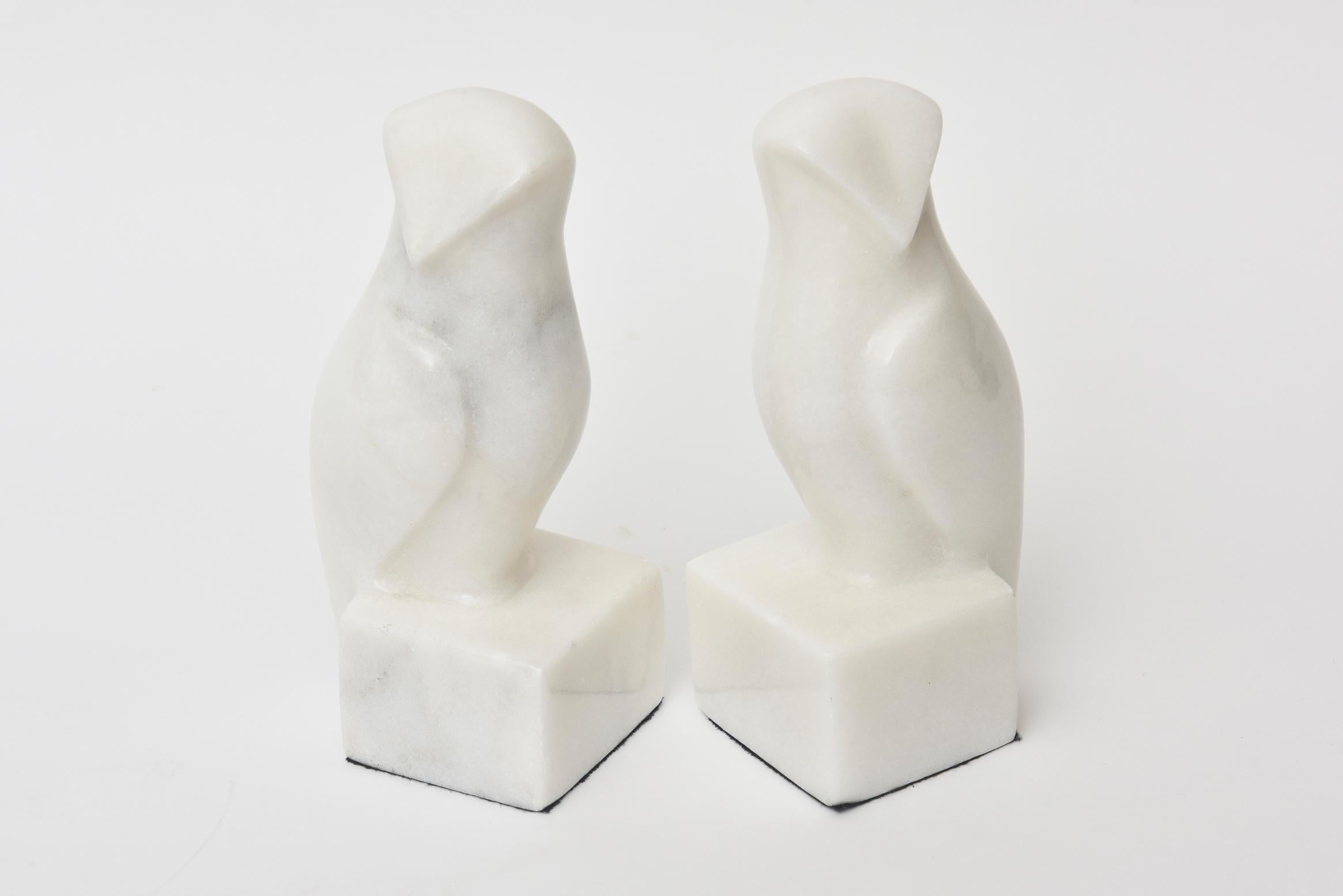These pair of white marble vintage sculptural modernist owl bookends are a great desk accessory or perfect for any bookcase. They have the original label on the bottom which reads J.A.B. Mark of quality genuine marble. These are great!

 