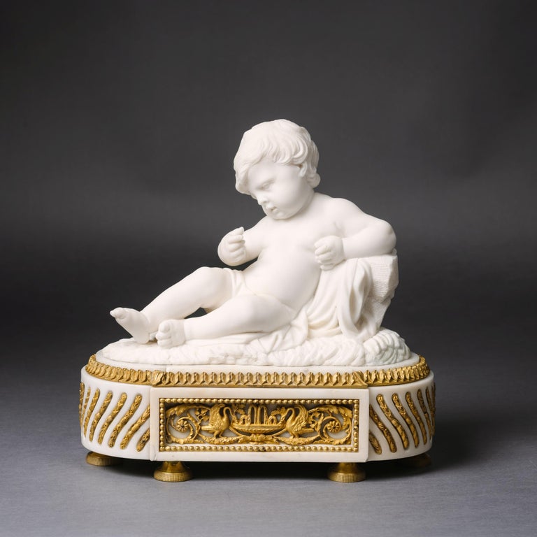 French Pair of White Marble Sculptures of Reclining Putti For Sale