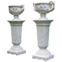 Asian Pair of Marble Urns after the Warwick Vase on White Marble Pedestals