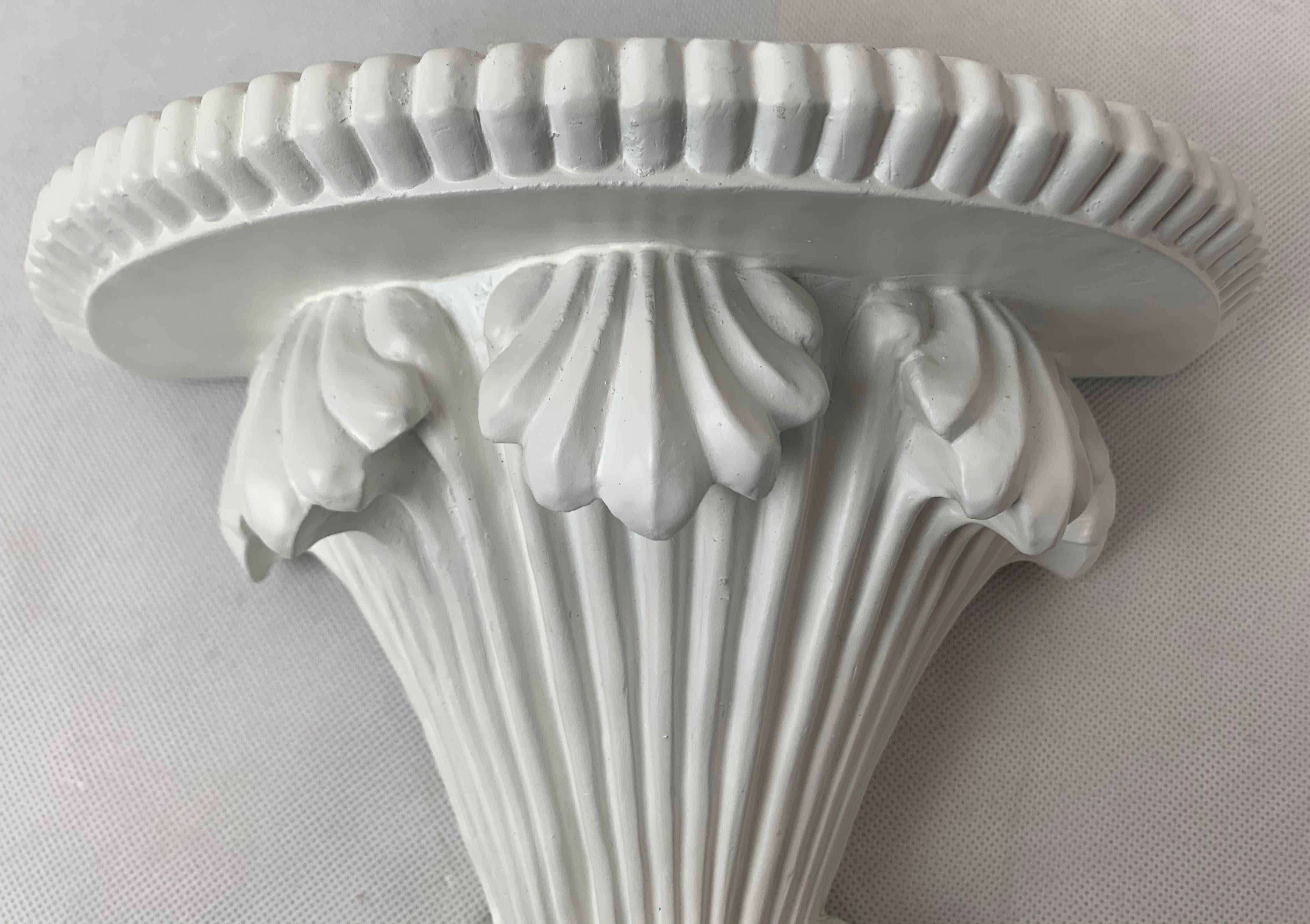 Carved A Pair of Wall Brackets in White in a Neoclassical Style