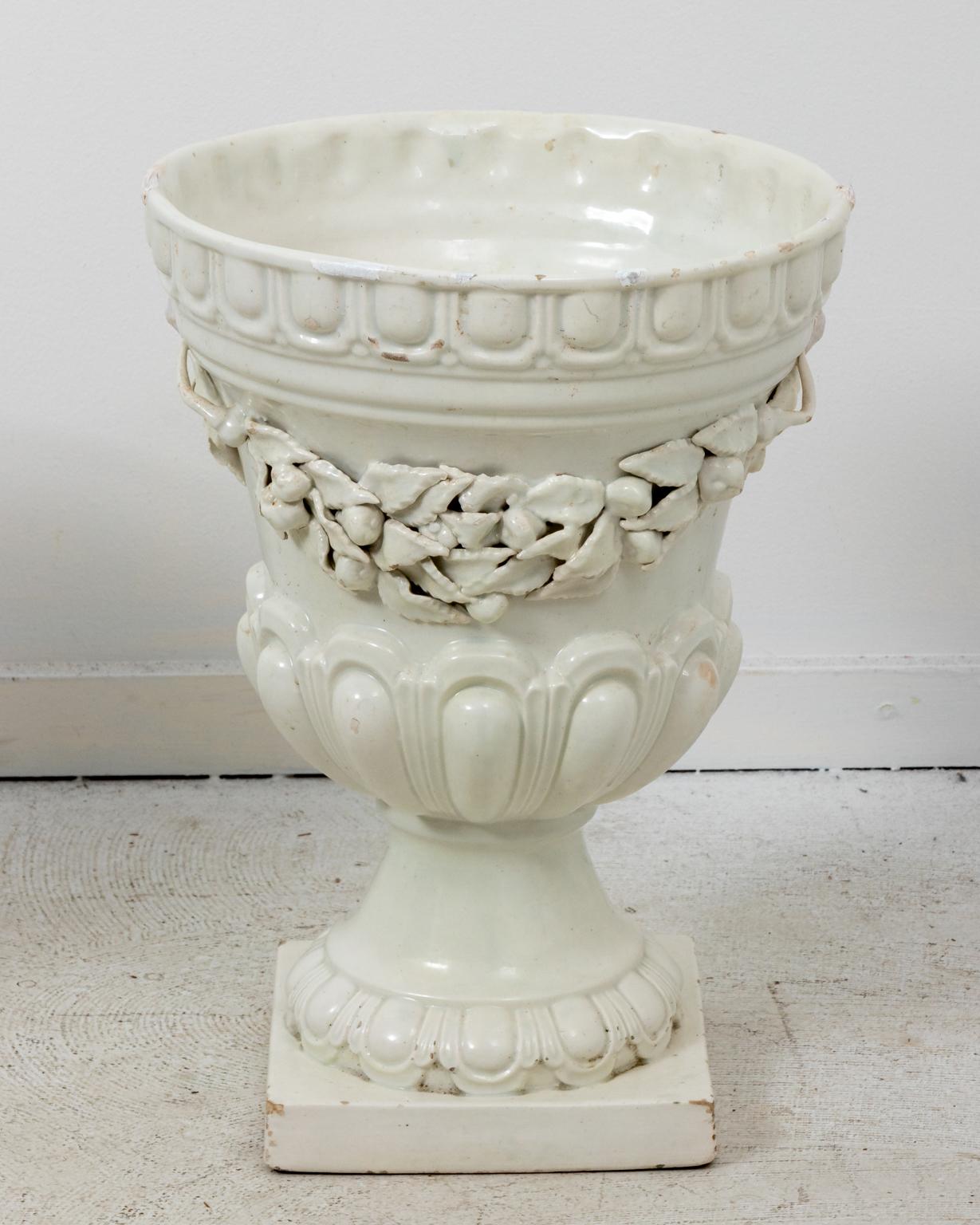 Pair of White Neoclassiclal Style Urns In Distressed Condition In Stamford, CT