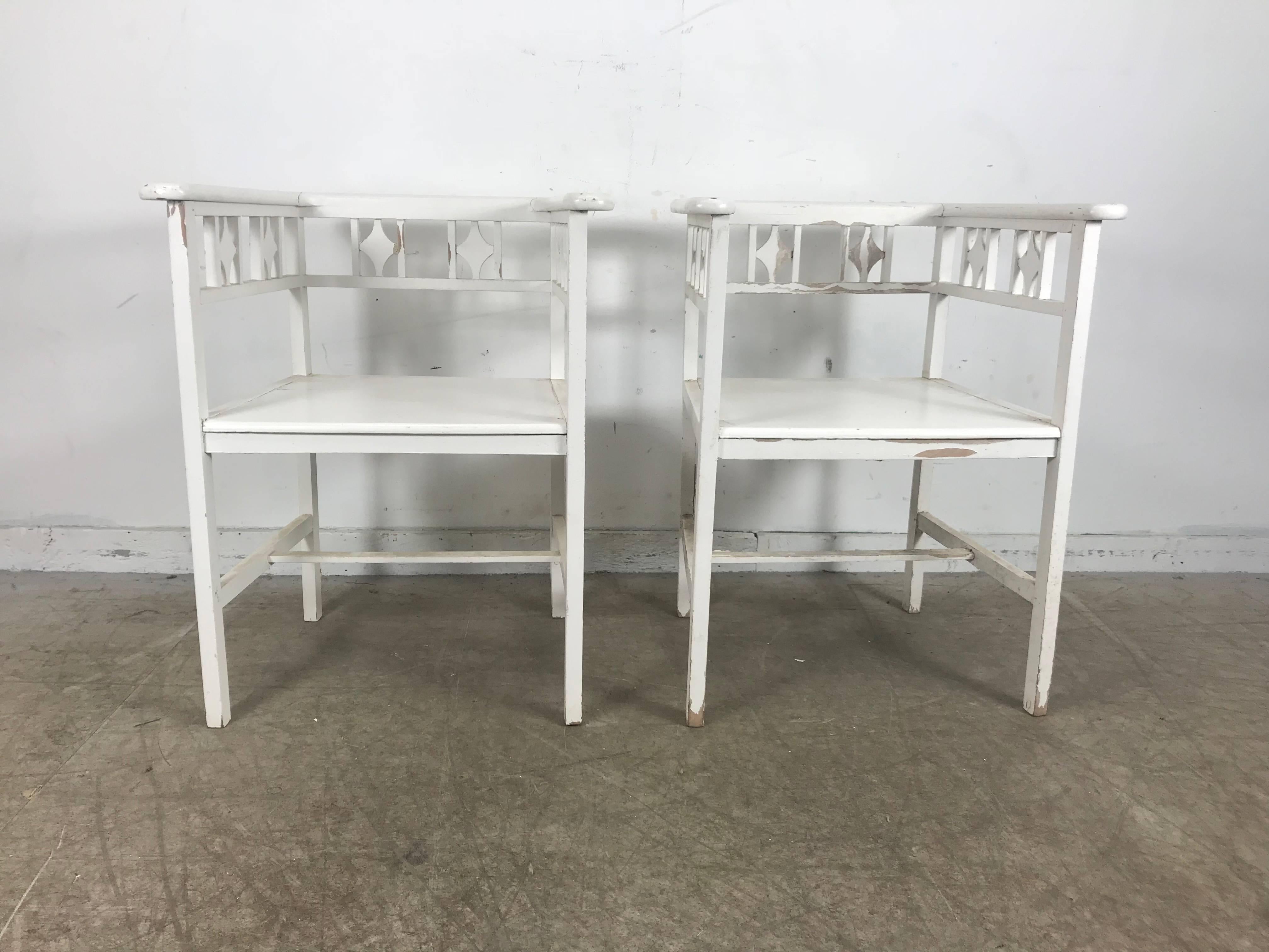 Pair of white painted Austrian cube even armchairs in the manner of Josef Hoffmann, original white painted finish, Arts & Crafts style pierced open lattice work, stunning.
