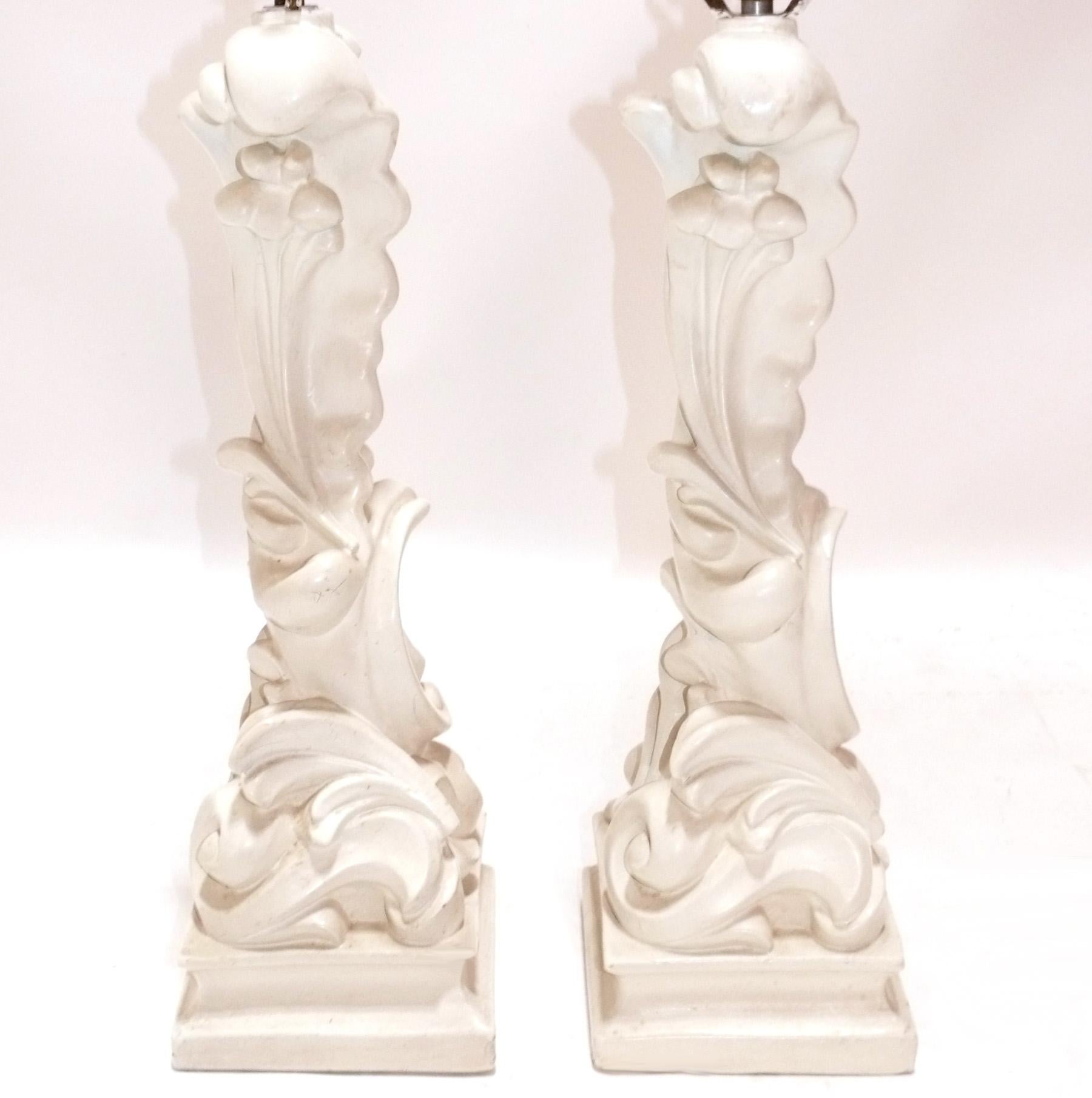 Pair of sculptural white plaster foliate lamps, in the manner of Serge Roche, France, circa 1940s. They have been rewired for US usage and are ready to use.