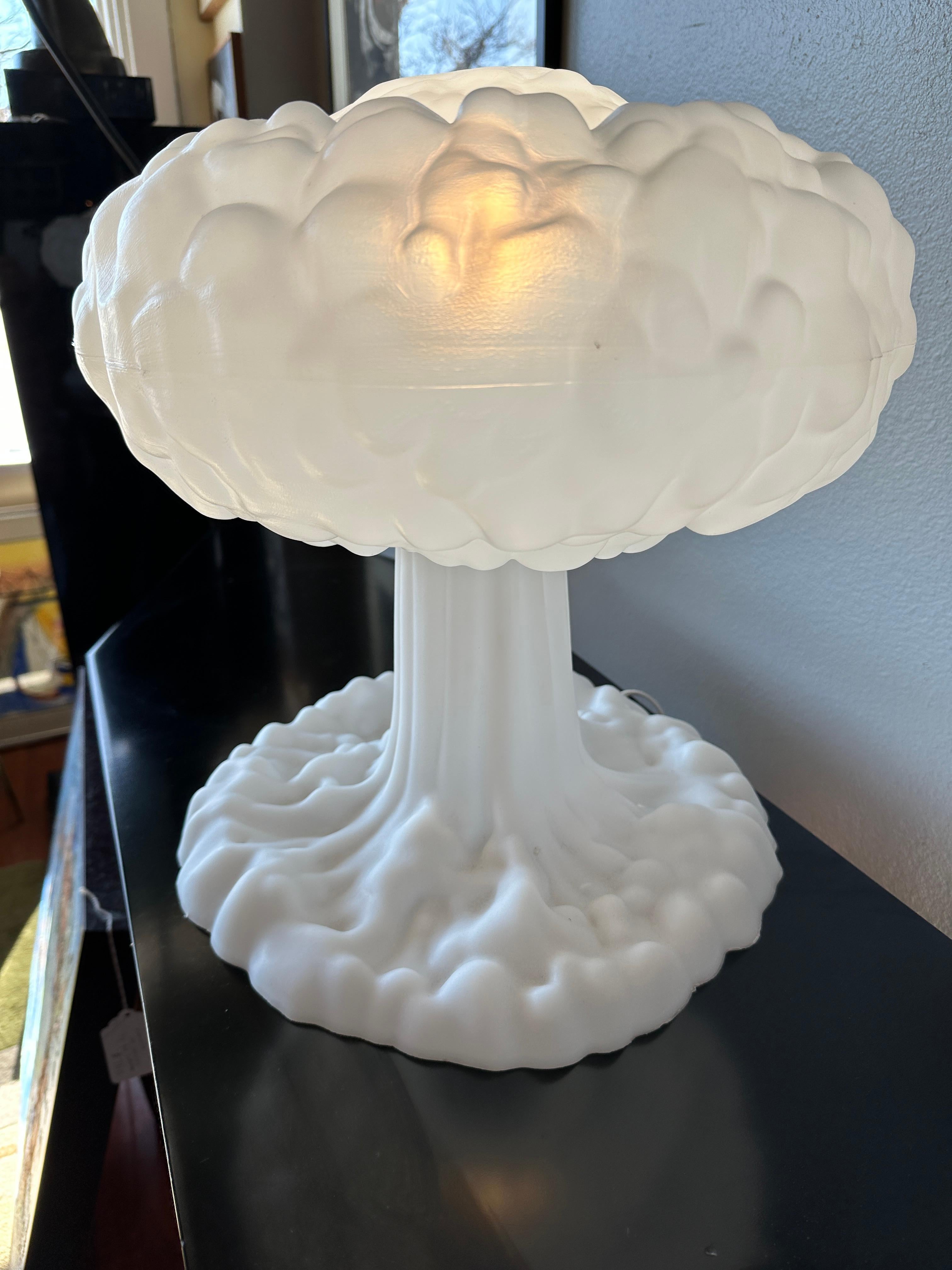 This pair of lamps are designed to look like mushroom clouds but with a playful and cartoonish appearance. The overall design is a real success, as it manages to dispel the gravity associated with atomic imagery in favor of a feeling of