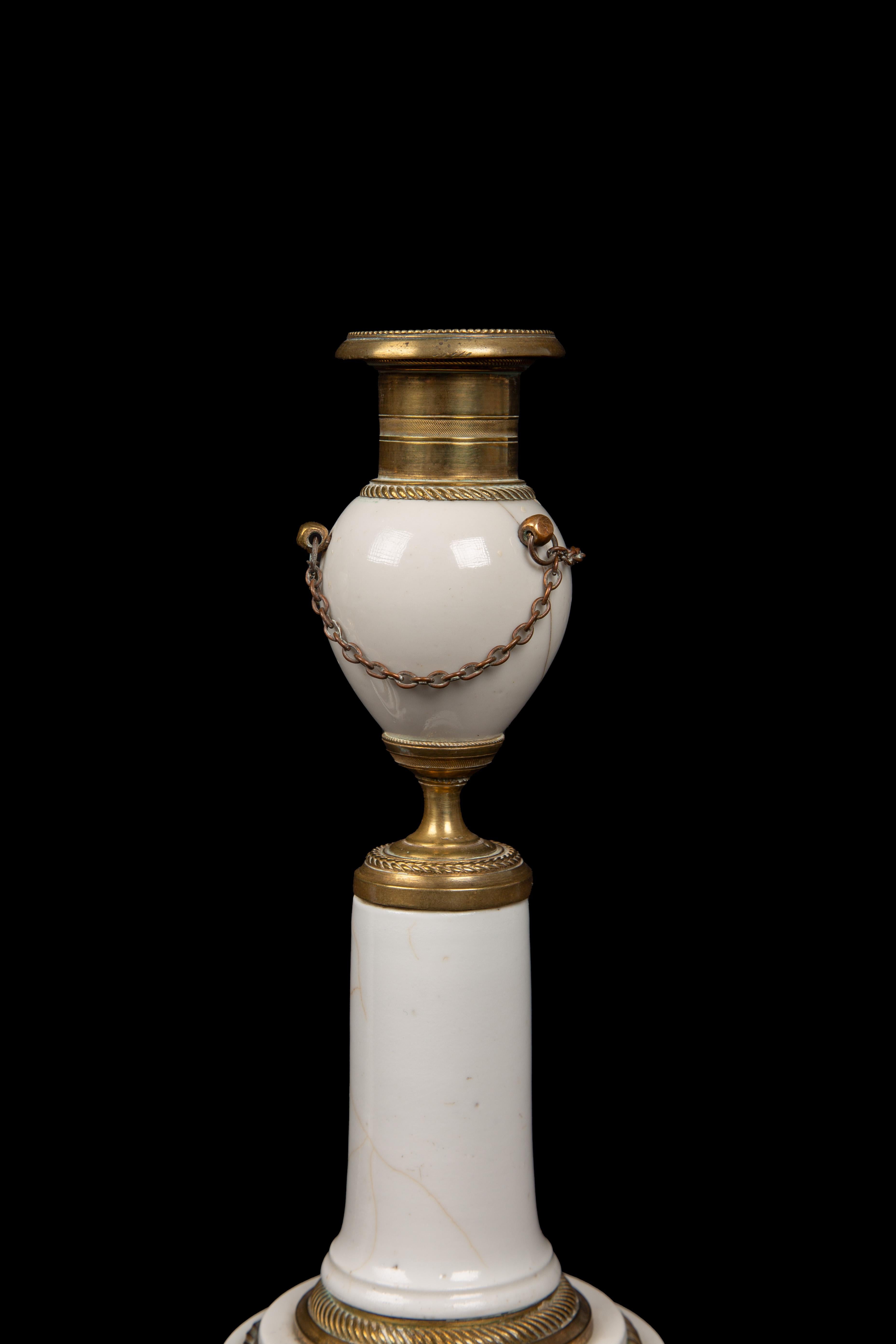 Pair of White Porcelain and Bronze Candlesticks, From Late Louis XVI Period In Good Condition For Sale In New York, NY
