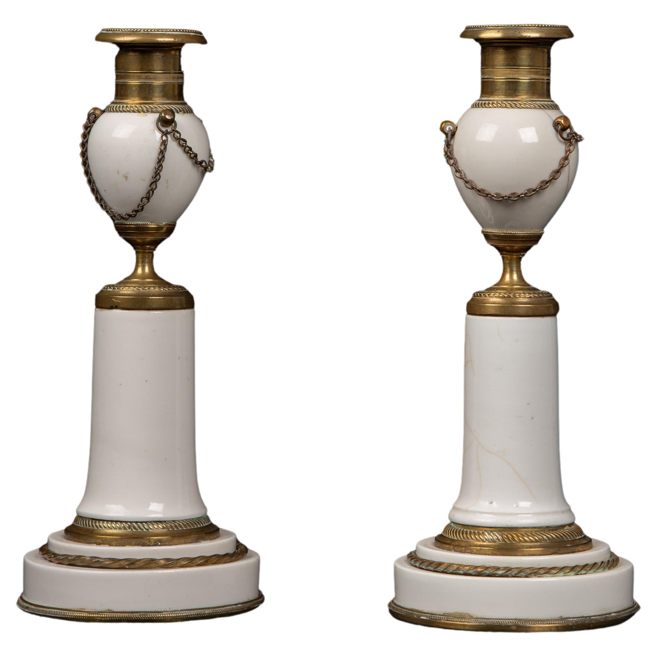 Pair of White Porcelain and Bronze Candlesticks, From Late Louis XVI Period For Sale
