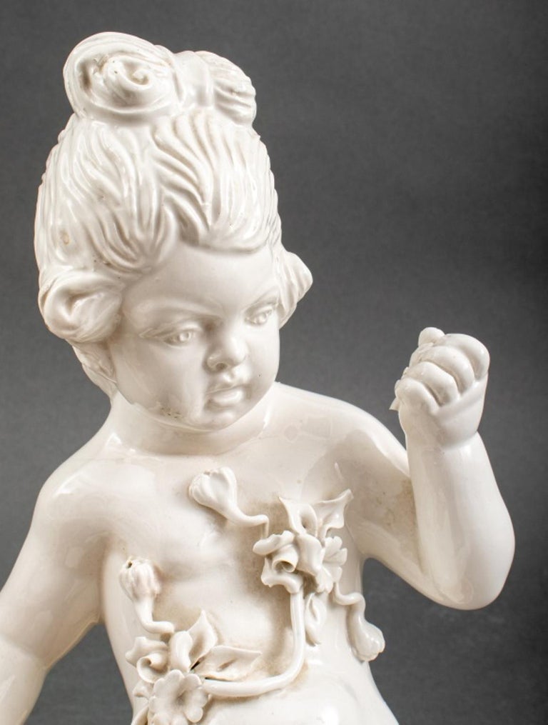 Pair of White Porcelain Cherub Putti Sculptures For Sale at 1stDibs