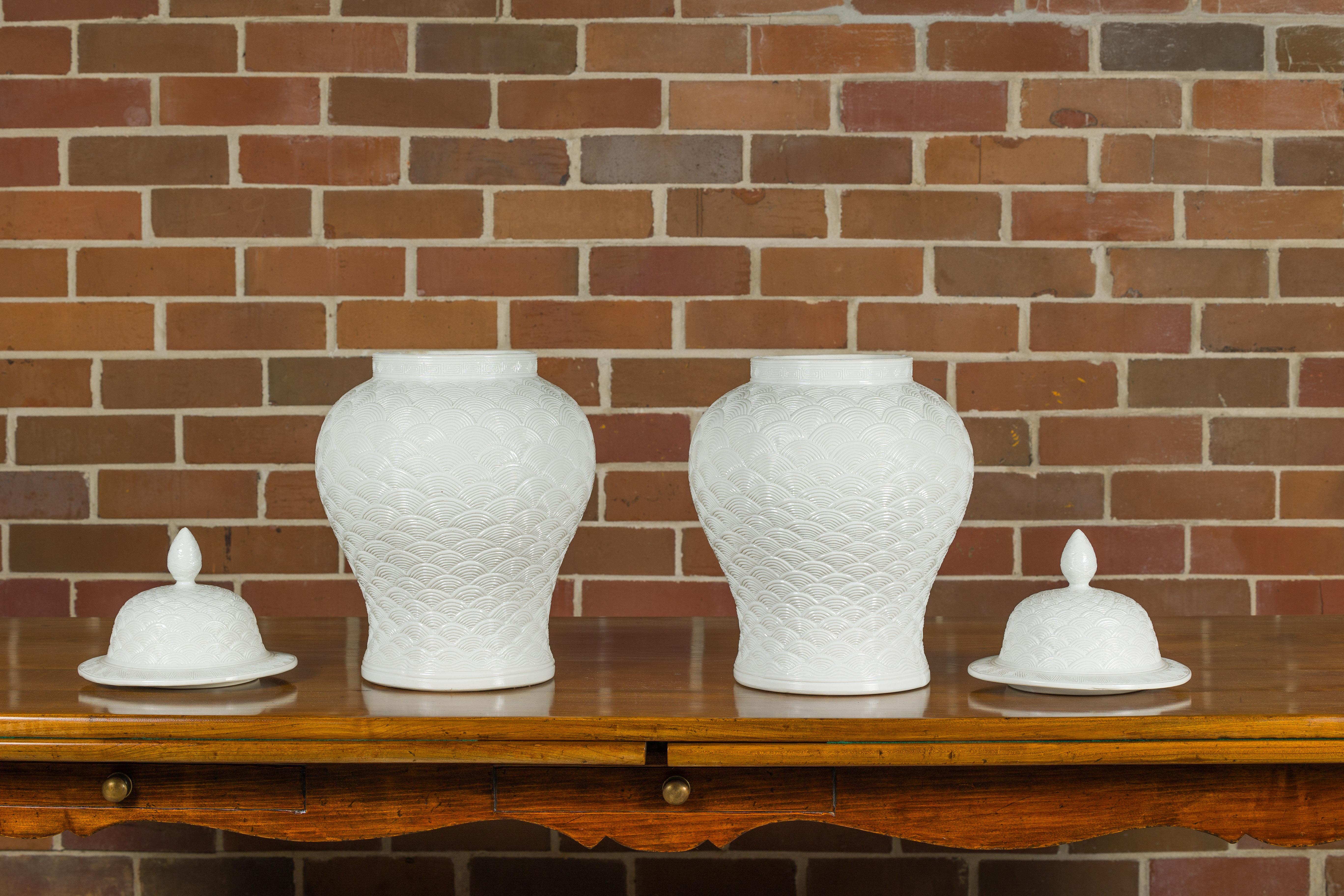 Pair of White Porcelain Fish Scale Lidded Jars with Petite Finials In Good Condition For Sale In Atlanta, GA