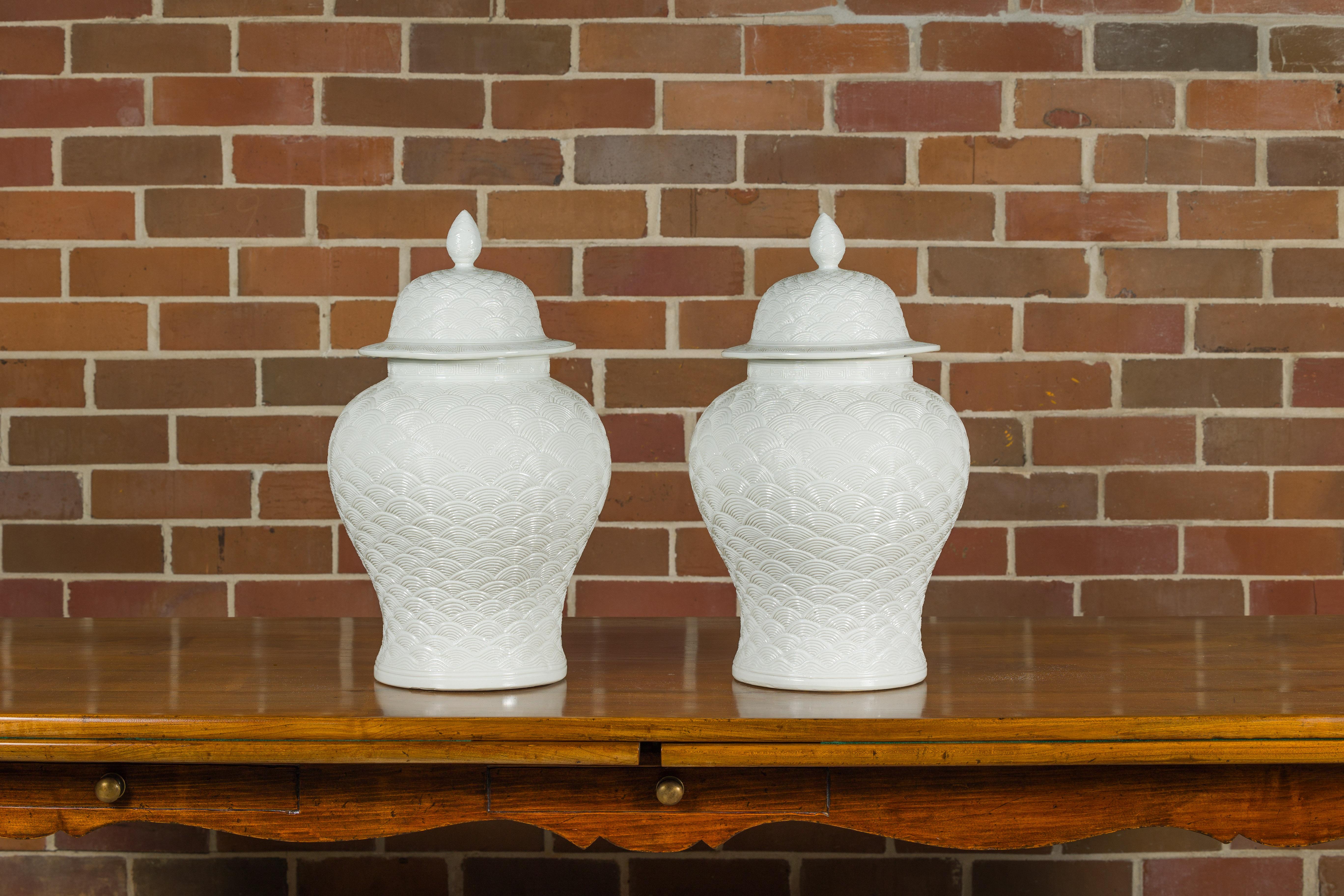 20th Century Pair of White Porcelain Fish Scale Lidded Jars with Petite Finials For Sale