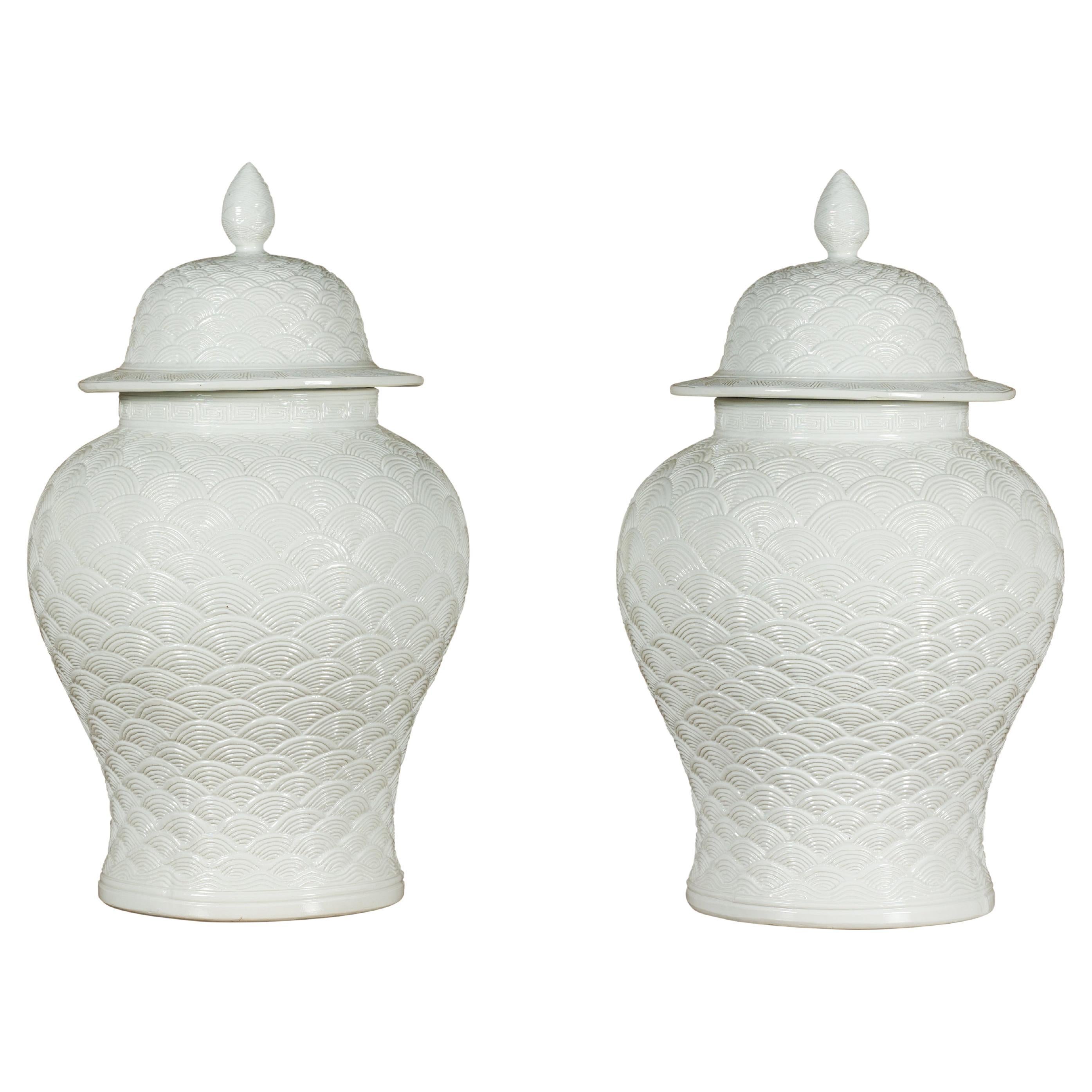 Pair of White Porcelain Fish Scale Lidded Jars with Petite Finials For Sale