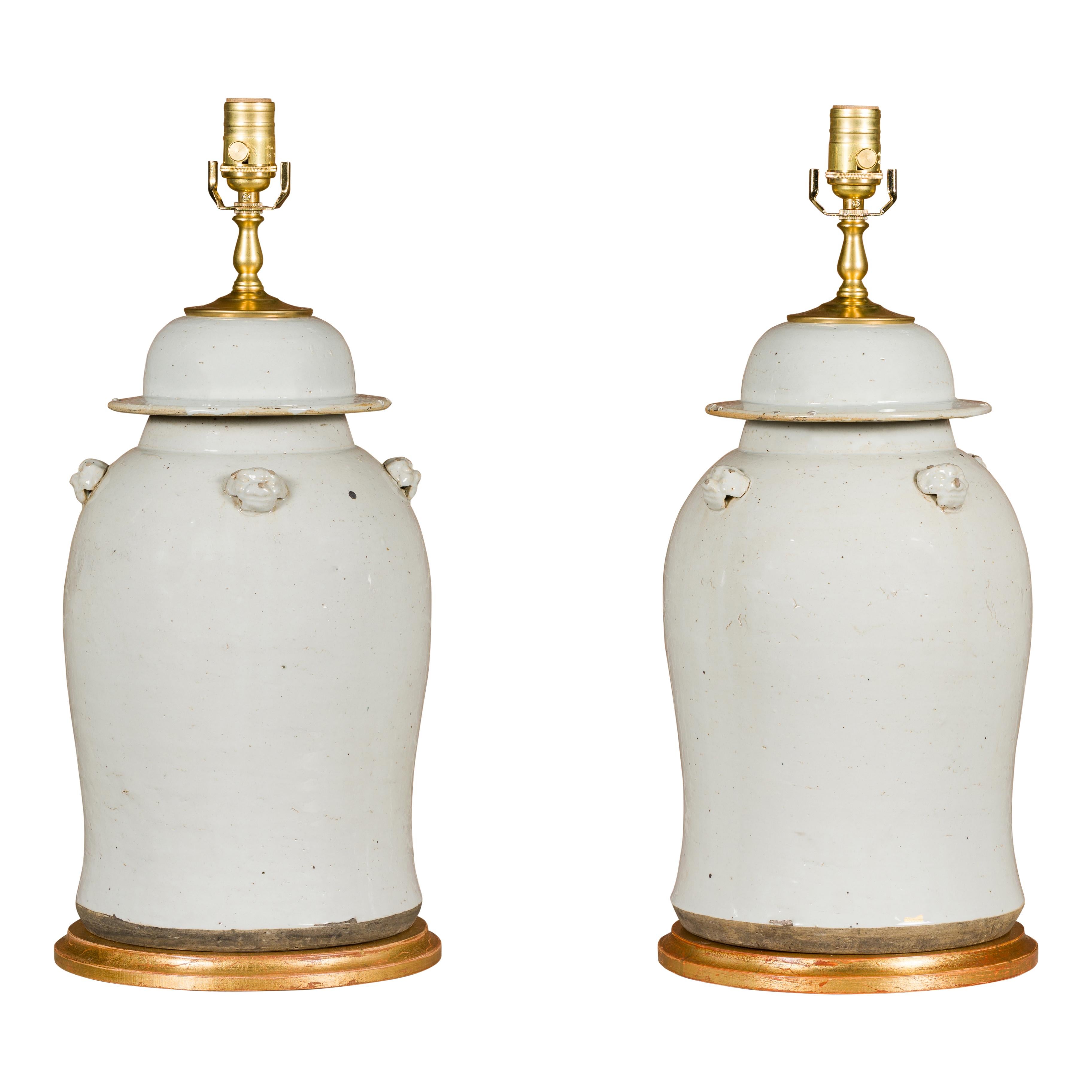Pair of White Porcelain Lidded Urns Made into Table Lamps on Gilded Bases For Sale 11