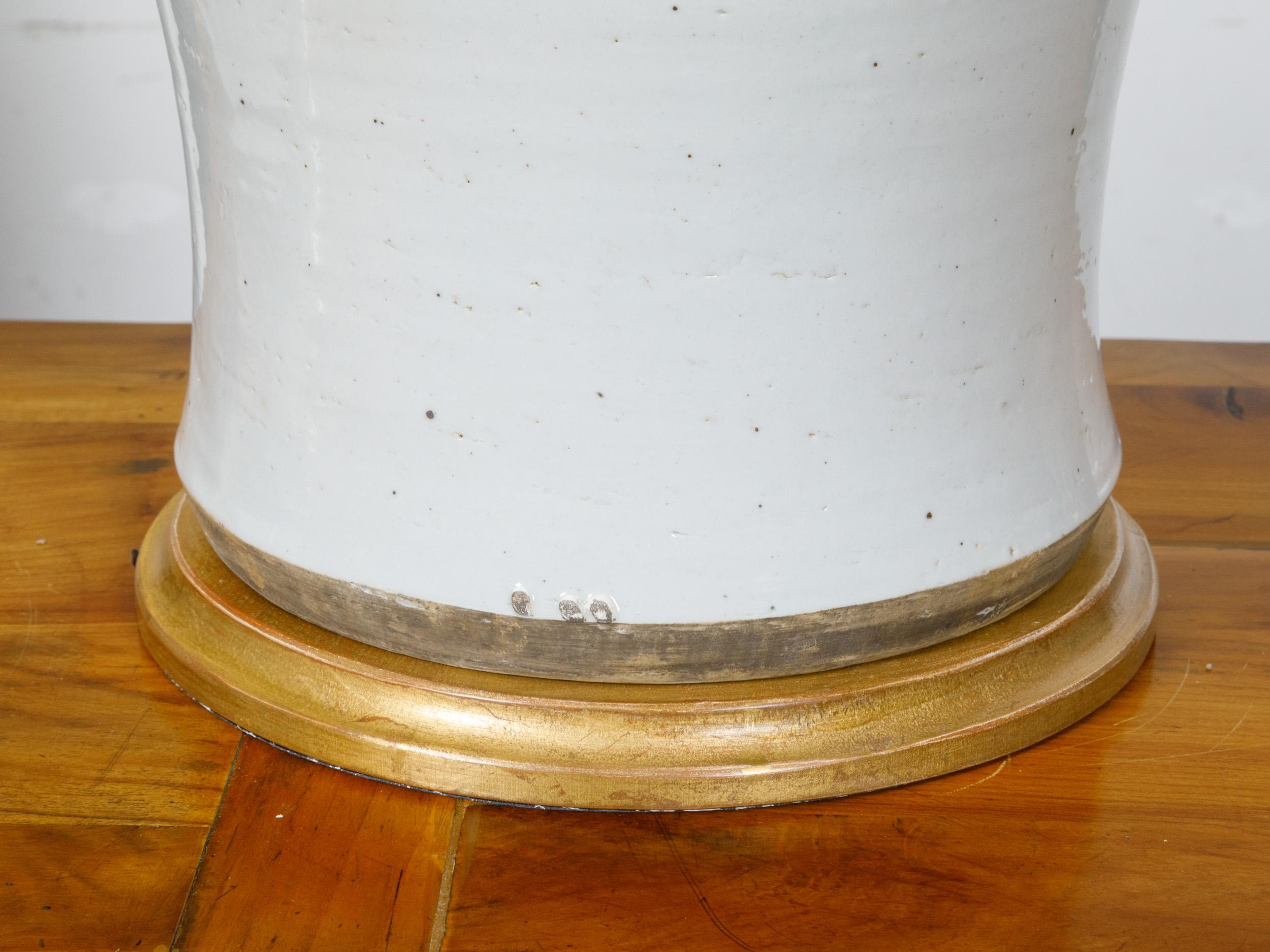 Brass Pair of White Porcelain Lidded Urns Table Lamps on Gilt Bases, US-Wired For Sale
