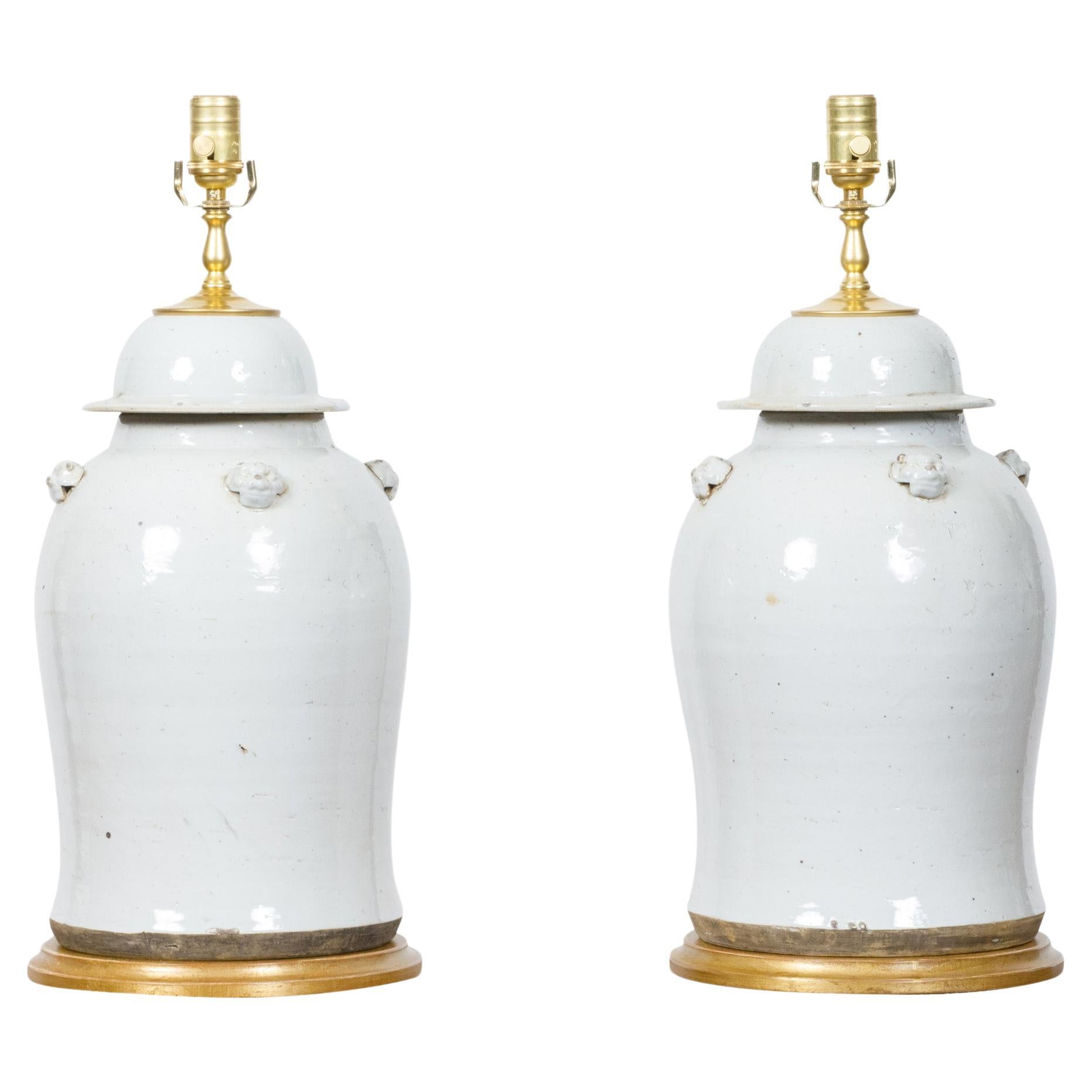 Pair of White Porcelain Lidded Urns Table Lamps on Gilt Bases, US-Wired
