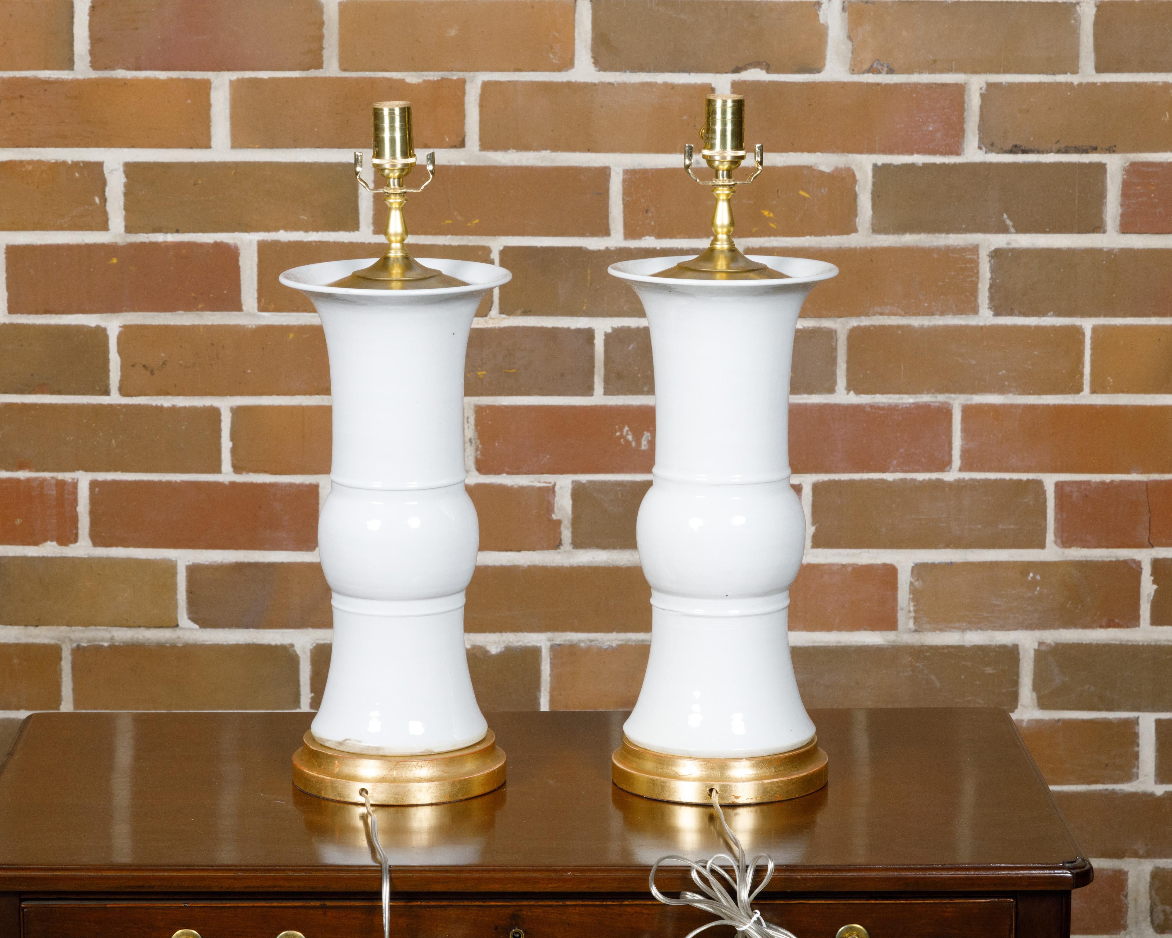 Glazed Pair of White Porcelain Table Lamps on Custom Giltwood Bases, Wired for the USA For Sale