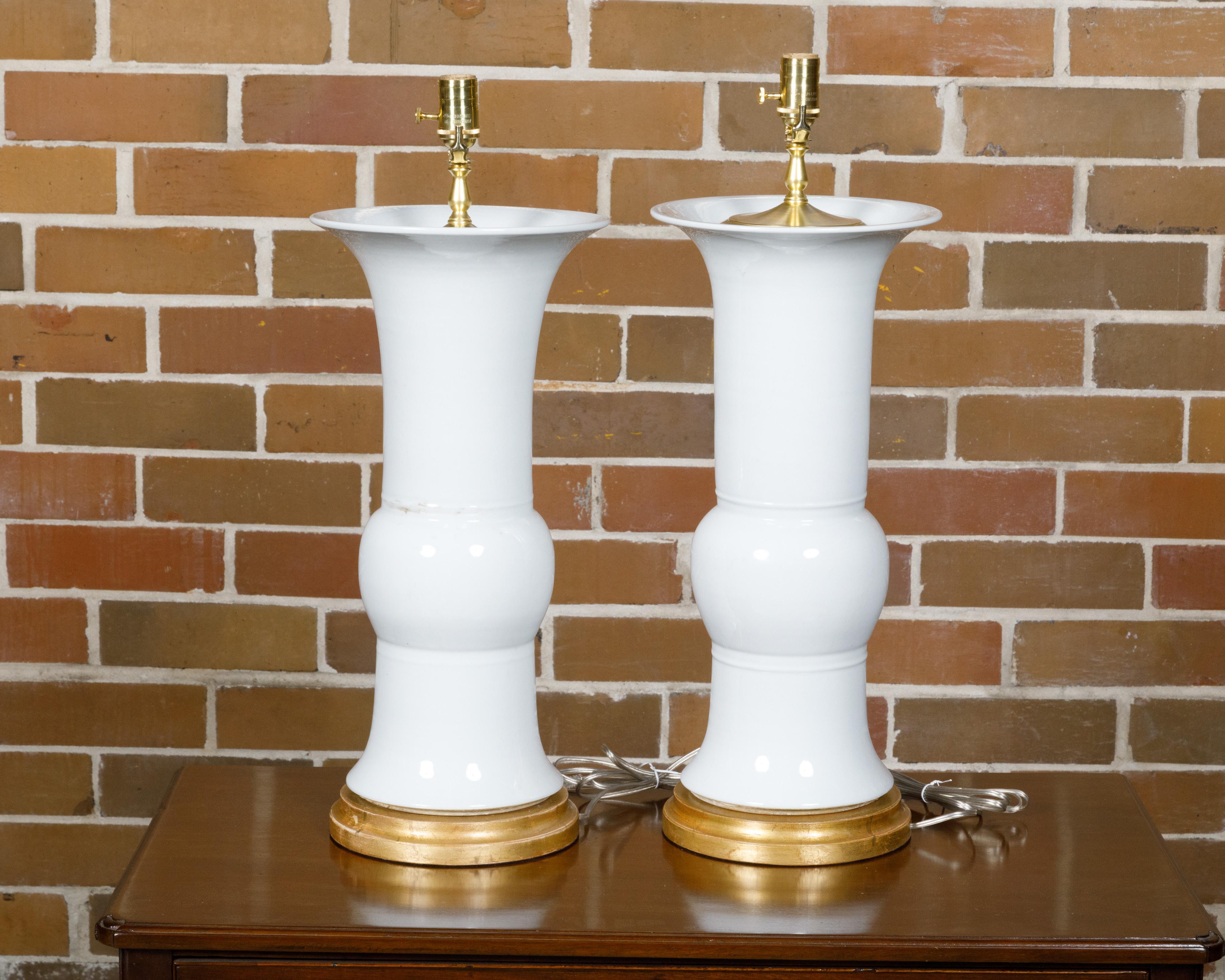Contemporary Pair of White Porcelain Table Lamps on Custom Giltwood Bases, Wired for the USA For Sale