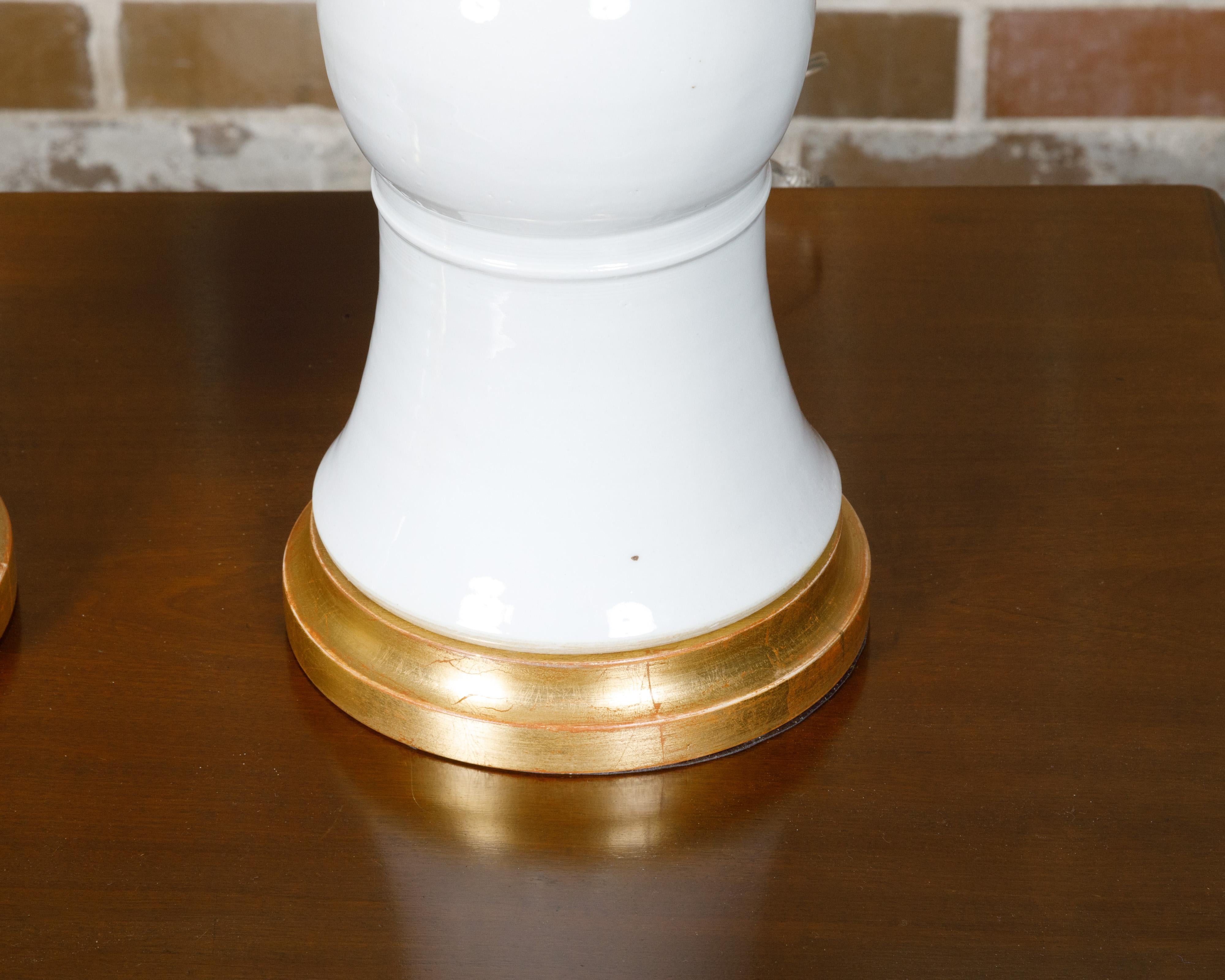 Contemporary Pair of White Porcelain Table Lamps on Custom Giltwood Bases, Wired for the USA For Sale
