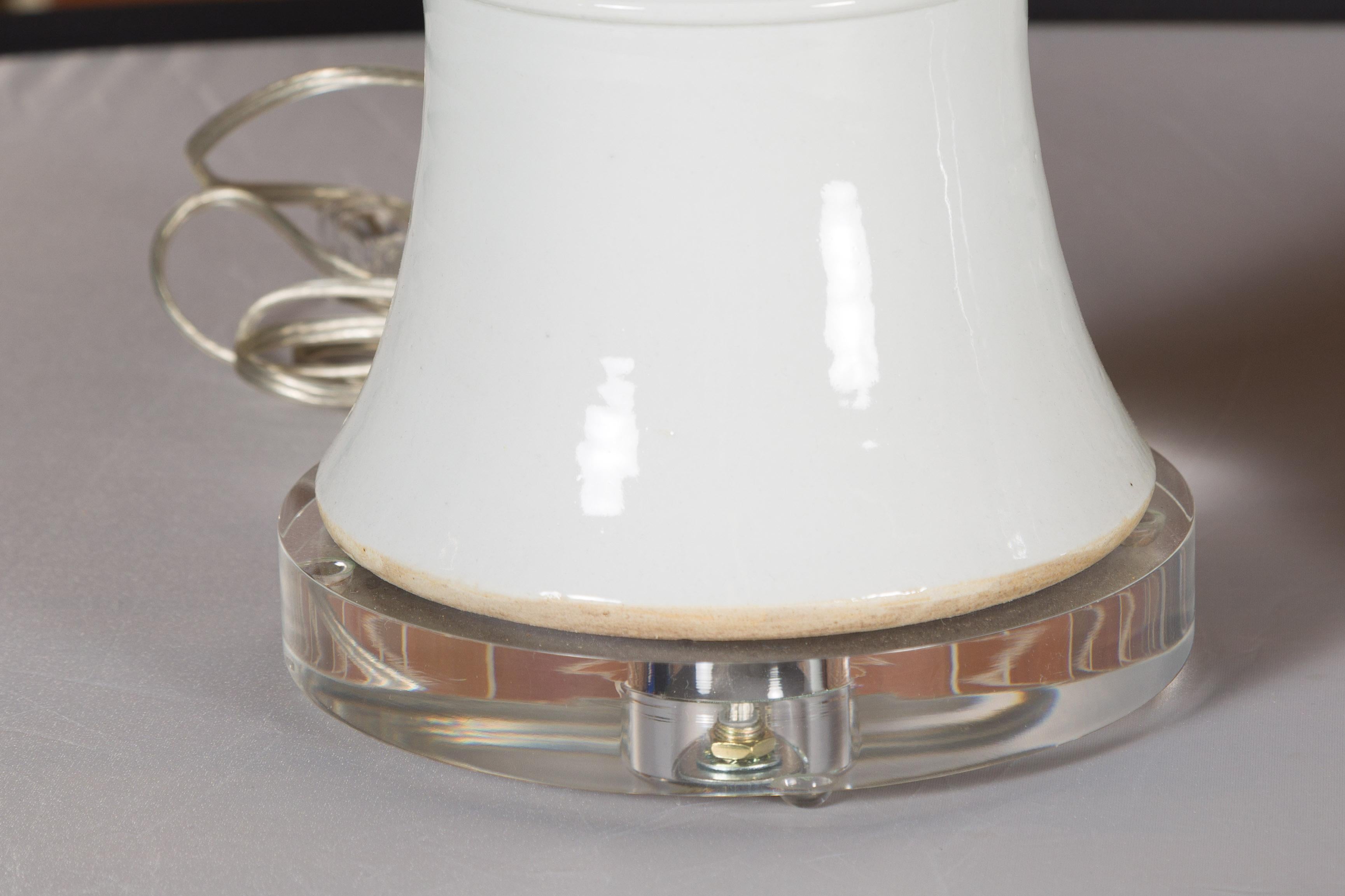 20th Century Pair of White Porcelain Table Lamps on Custom Lucite Bases, Wired for the USA