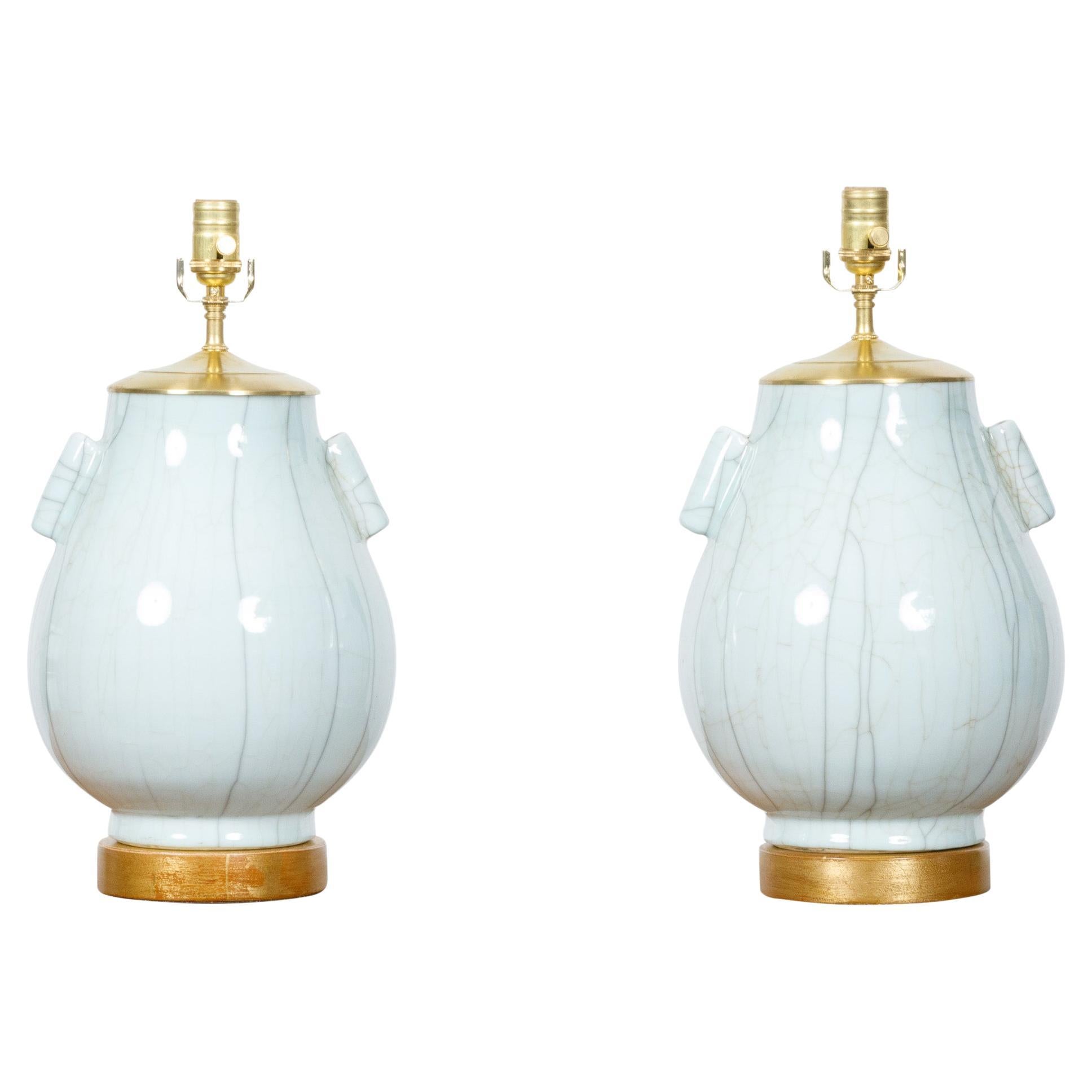 Pair of White Porcelain Tulip Shaped Vases with Crackle Finish Made into Lamps For Sale
