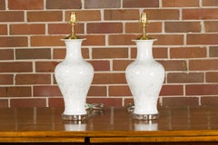 Pair of White Porcelain Vase Table Lamps on Lucite Bases with Textured Décor