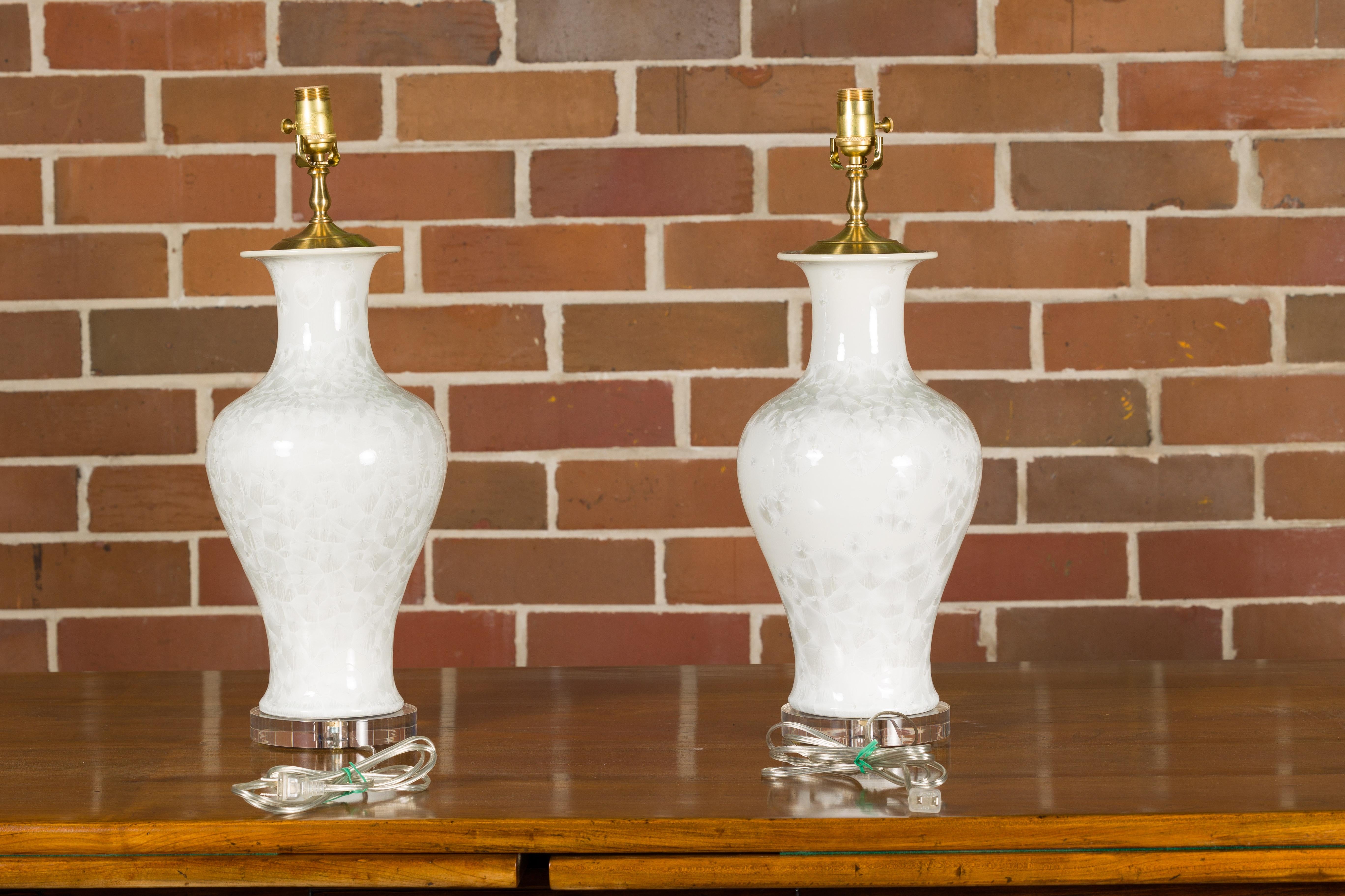 Pair of White Porcelain Vase Table Lamps on Lucite Bases with Textured Décor For Sale 1