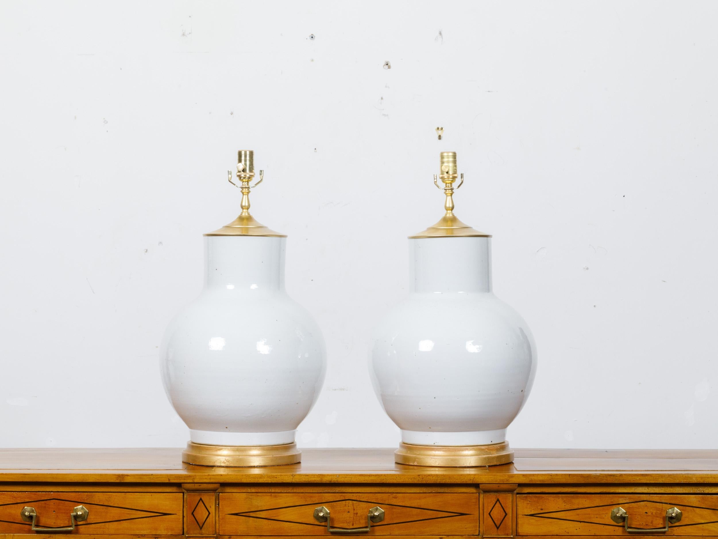 Pair of White Porcelain Vases Made into US-Wired Table Lamps on Giltwood Bases For Sale 4