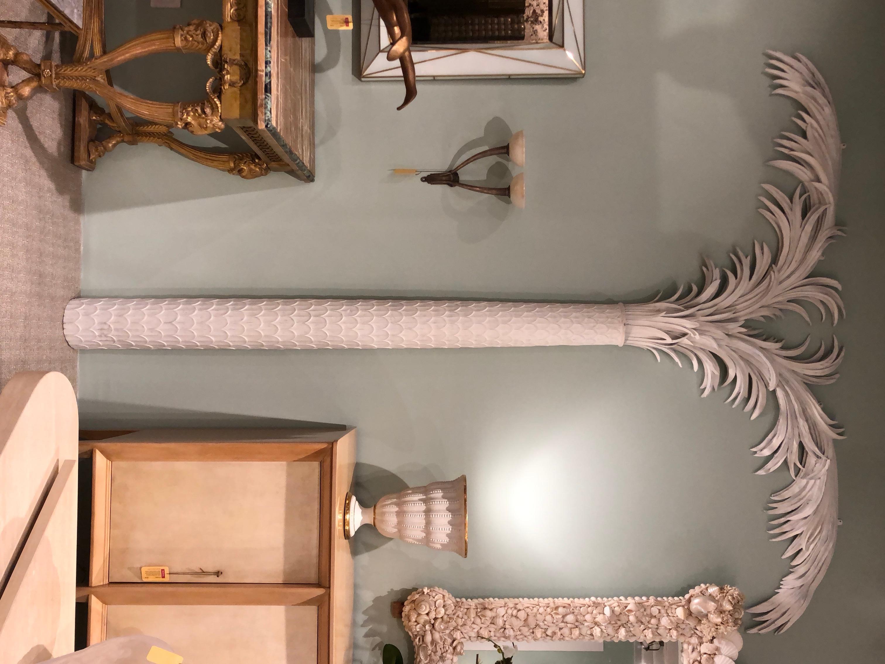 Pair of white resin pilaster palm tree copies of originals by Tate & Hall circa 1930. The New York decorator Marian Hall, of the firm Tate and Hall, commissioned them for Frances and Carl Schmidlapp, an investment banker who bought an apartment at