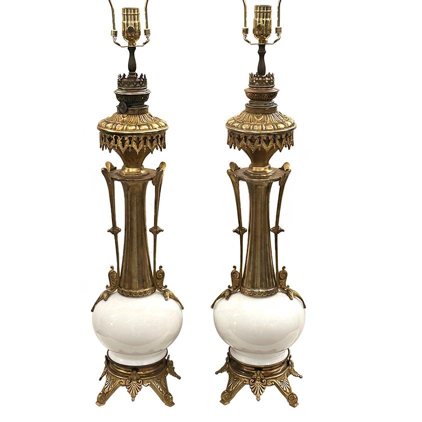 Pair of electrified 19th Century French oil table lamps.

Measurements:
Height of body: 27.5