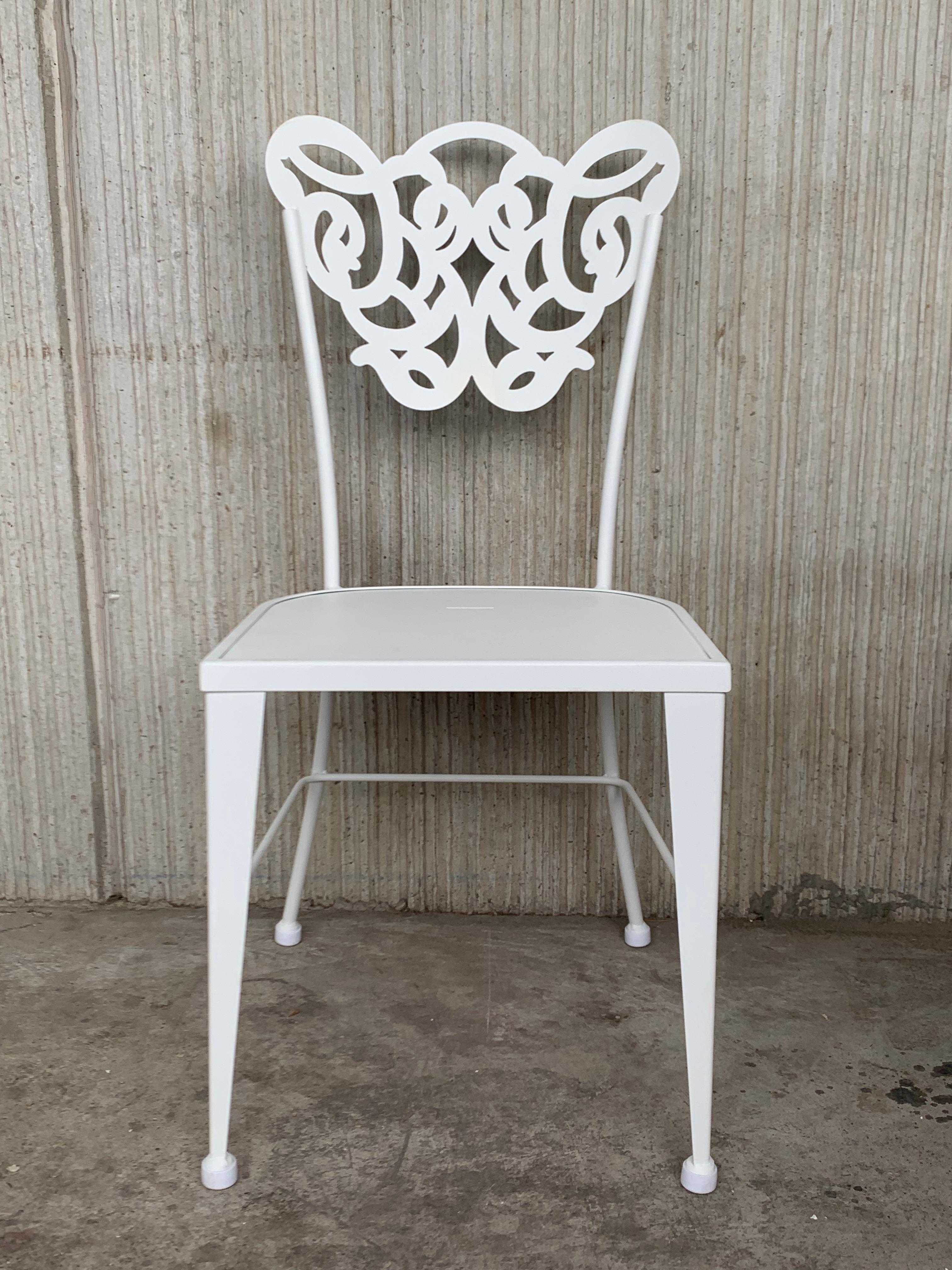 Spanish Pair of White Two Garden or Dining Chairs in Wrought Iron with Laser Back For Sale