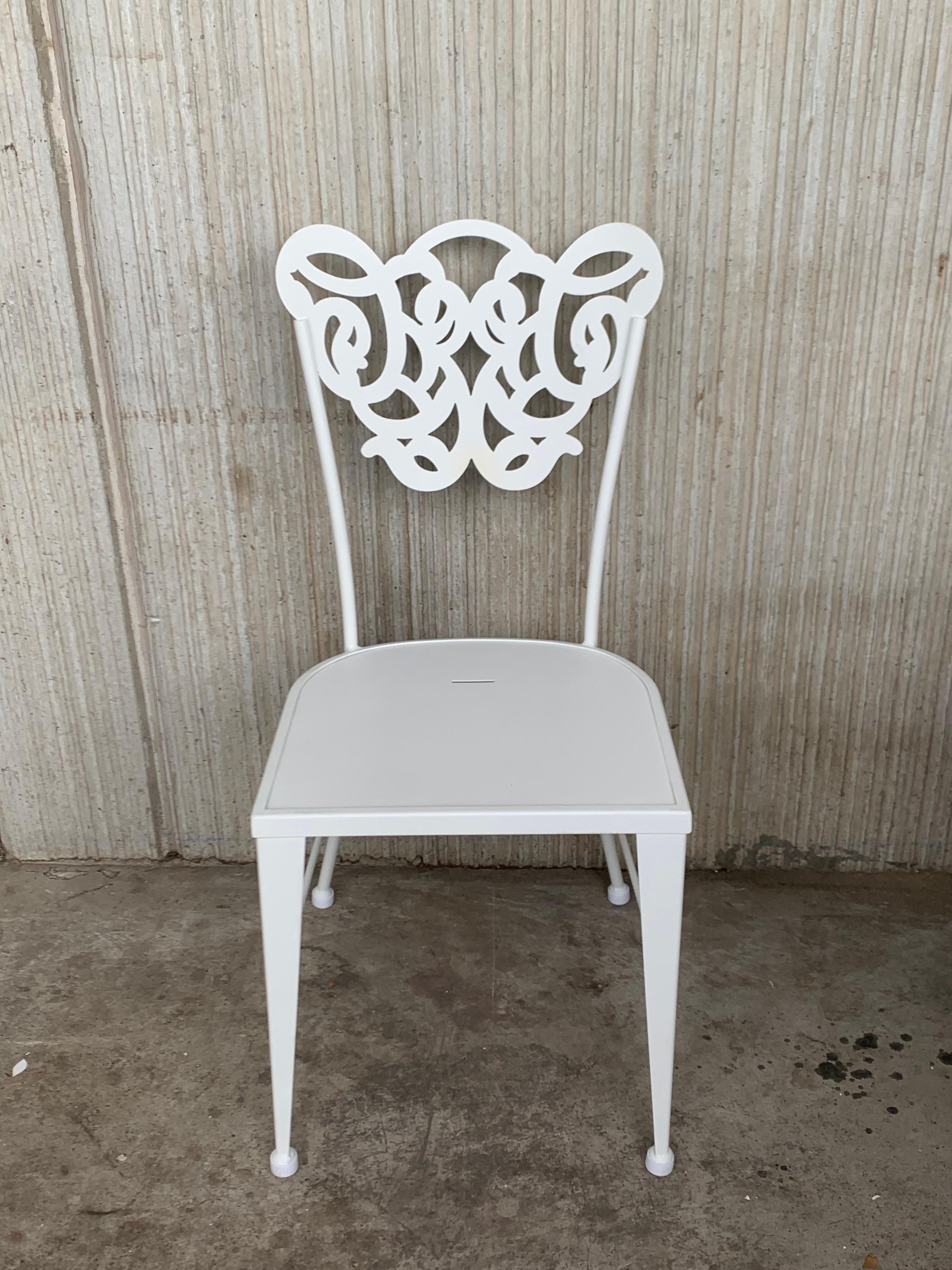 Pair of White Two Garden or Dining Chairs in Wrought Iron with Laser Back In Excellent Condition For Sale In Miami, FL